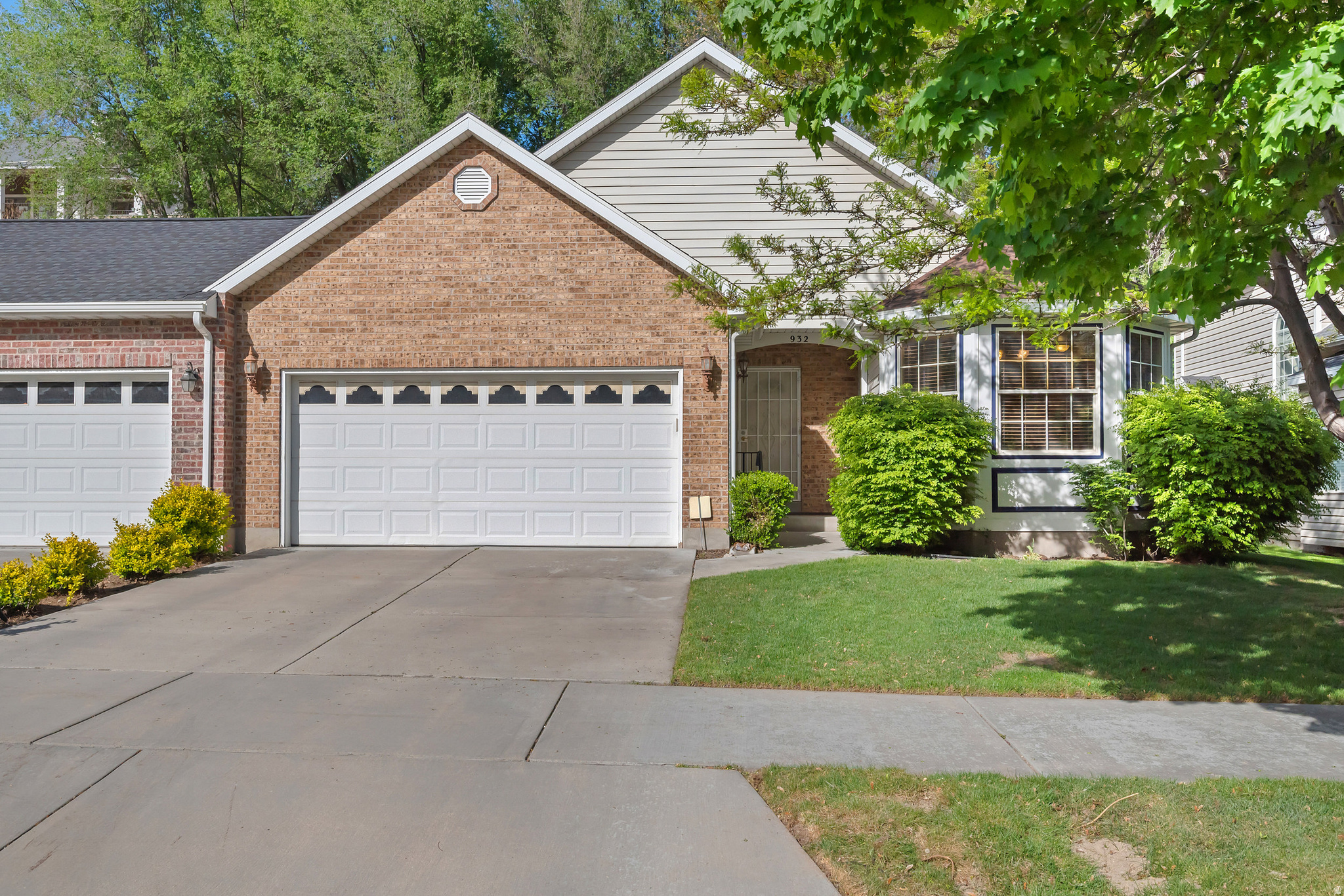 This charming twin home sits in the sought-after Park Ridge community, offering both comfort and convenience. Located just minutes from Provo High School, Brigham Young University, Utah Valley University, and I-15. The community itself features a welcoming atmosphere with amenities including an indoor heated pool, fitness room, and a gathering space for events.  Inside, you'll find a bright single-level layout highlighted by vaulted ceilings that create an open, airy feel. The guest bathroom showcases an acrylic soaking tub convenient for those who have hard time getting in and out of bathtubs. The primary bedroom offers direct access to a peaceful back patio-perfect for quiet mornings or unwinding outdoors. Each bedroom provides a sense of privacy while still connecting seamlessly to the spacious family room, an ideal setting for entertaining guests or enjoying a relaxing evening at home.