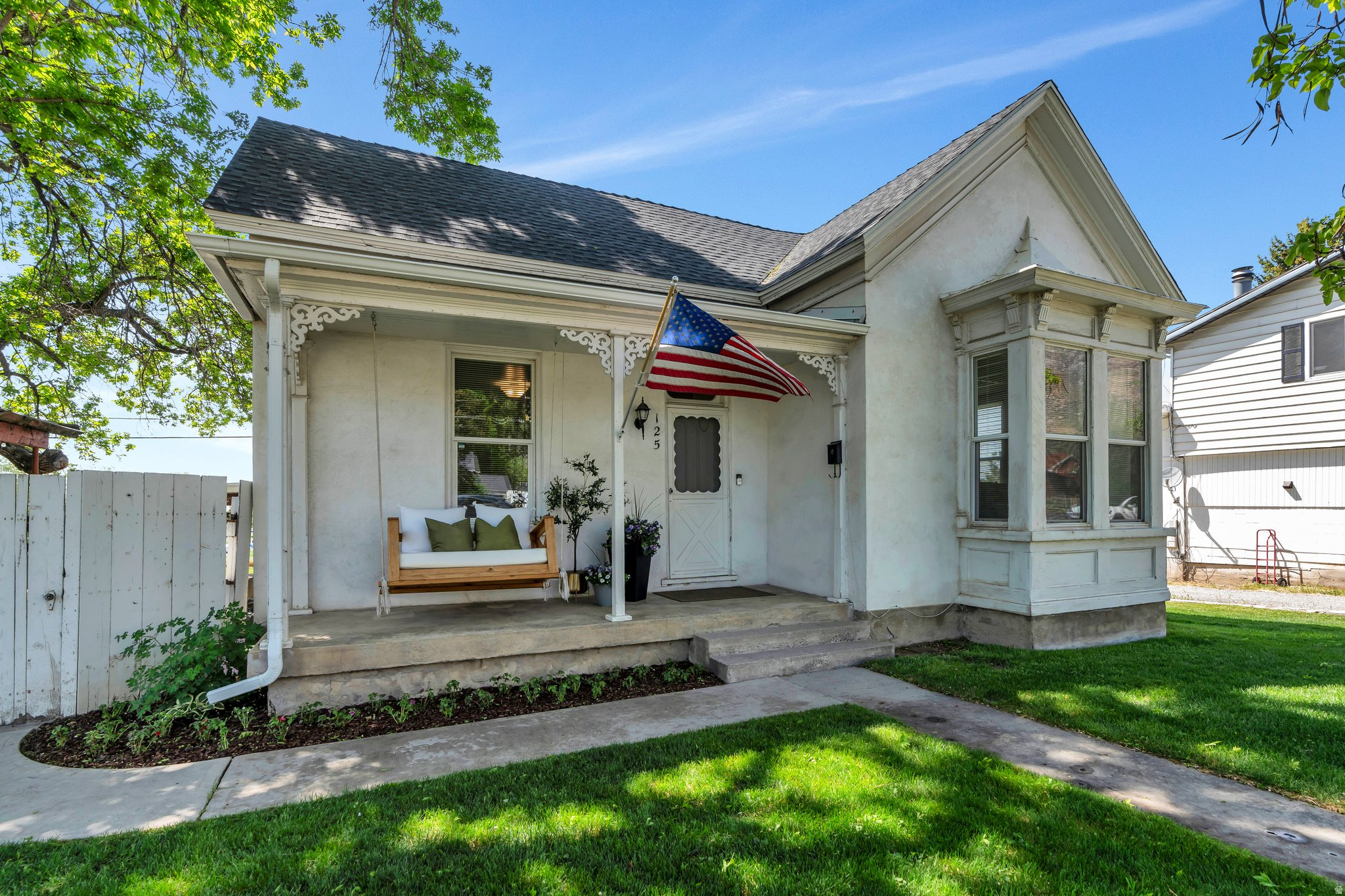 Step into timeless charm with this beautifully maintained Pleasant Grove gem! This home offers the character you crave-tall ceilings, oversized windows, and HUGE bedrooms that flood with natural light. The bathroom has been updated for modern comfort, while original details keep the historic charm alive. Outside, enjoy a large yard with a covered patio-perfect for summer evenings-and a detached 2-car garage with extra parking and storage. Even more storage in basement/utility room under the home. Location? It doesn't get better. Just steps from the library, city parks, local restaurants, Macey's, Ace Hardware, bus stops, the rodeo grounds, and yes-even "Friends" gas station for your daily Diet Coke or preferred soda run. This home is a rare blend of vintage appeal and everyday functionality. Don't miss your chance to own a piece of Pleasant Grove history!