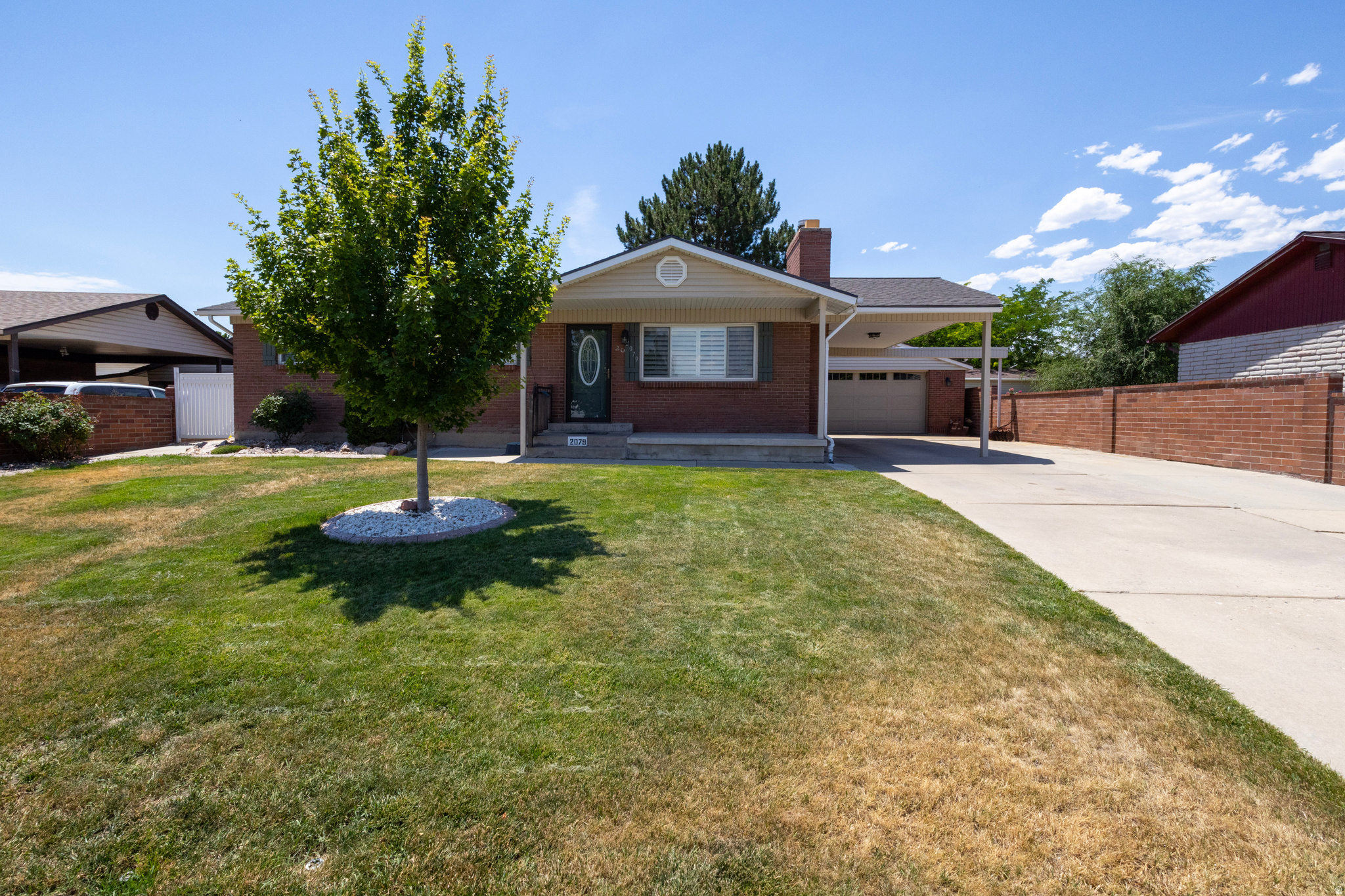 Welcome to 2079 Arthur Drive in West Jordan! This well-maintained home offers valuable updates and an exceptional garage setup for automotive enthusiasts, mechanics, hobbyists, or anyone needing additional workspace and storage. The kitchen and flooring have been updated, creating a refreshed and functional interior ready for its next owner. Major improvements include a roof replacement in 2021 and the main water line replaced in 2025. Conveniently located near shopping, dining, schools, parks, and major transportation routes.