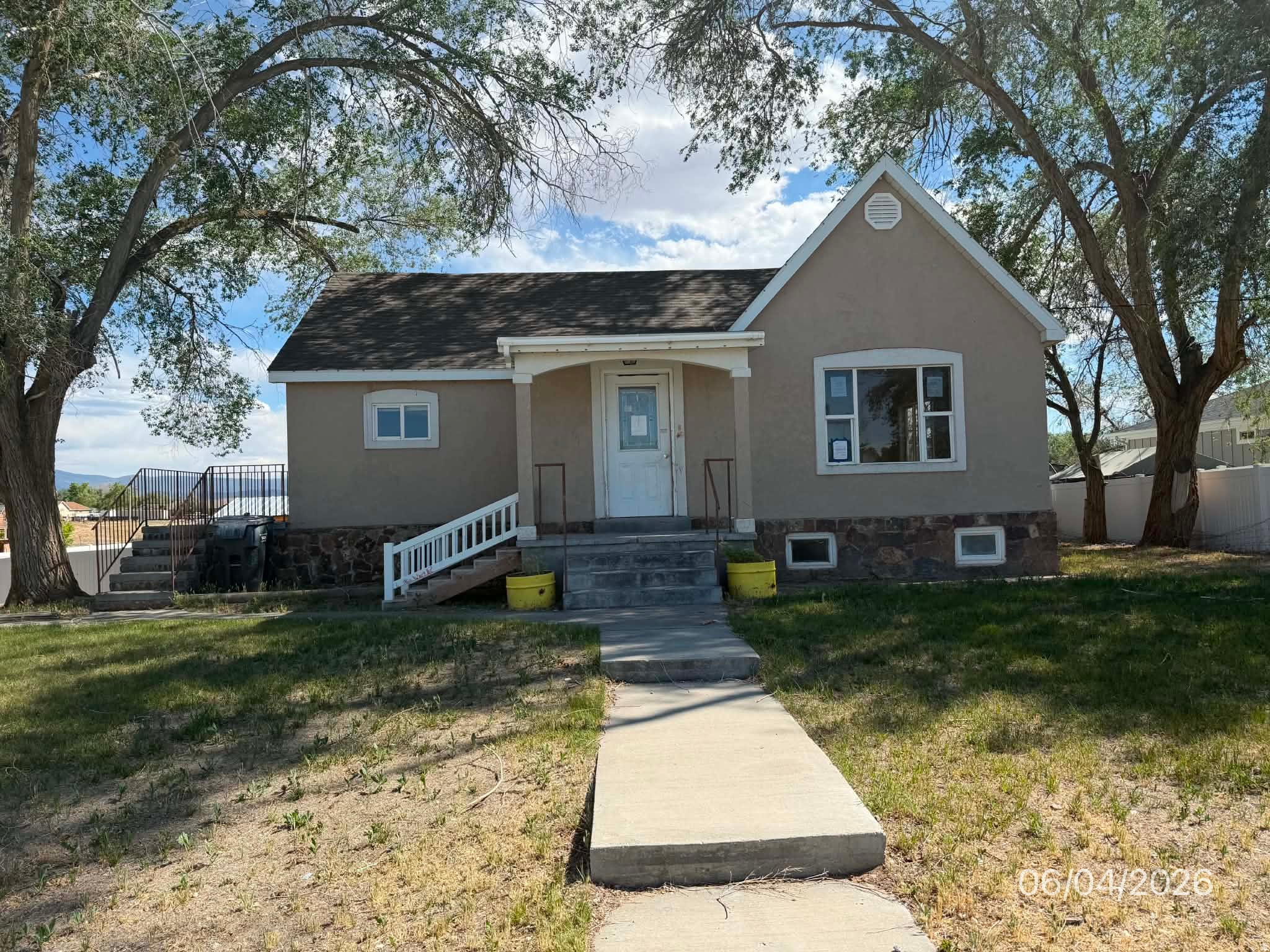 Over half acre lot. 2 bedrooms and 2 baths on main level plus more in finished basement. This house is a HUD owned home and your agent can show and then if you want to put an offer, it is an electronic bid on HUD's website. This house can go FHA with some repairs escrowed by buyer. $100 down payment program available with an FHA loan, call with questions or for a showing! Equal housing opportunity