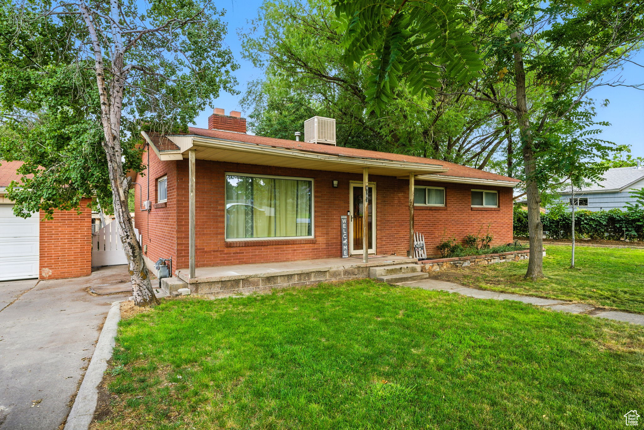 NEW PRICE!! WOW!! RARE FIND!!!  OVER AN ACRE in WEST JORDAN! HORSE PROPERTY! All Brick Home w/Detached Garage! Backs to the Canal for Privacy! Fenced! Mature Trees! Outbuildings! May be a subdividable possibility.  Zoned Single Family Homes.