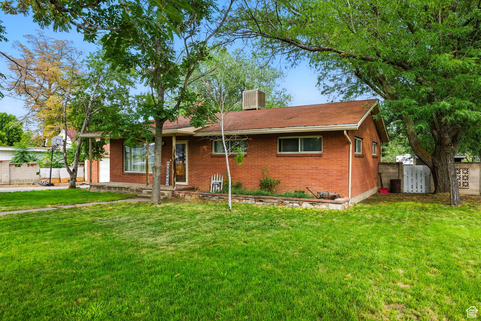 DON'T MISS OUT ON THIS NEW PRICE $799,900!! WOW!! RARE FIND!!!  OVER AN ACRE in WEST JORDAN! HORSE PROPERTY! All Brick Home w/Detached Garage! Backs to the Canal for Privacy! Fenced! Mature Trees! Outbuildings! May be a subdividable possibility.  Zoned Single Family Homes.
