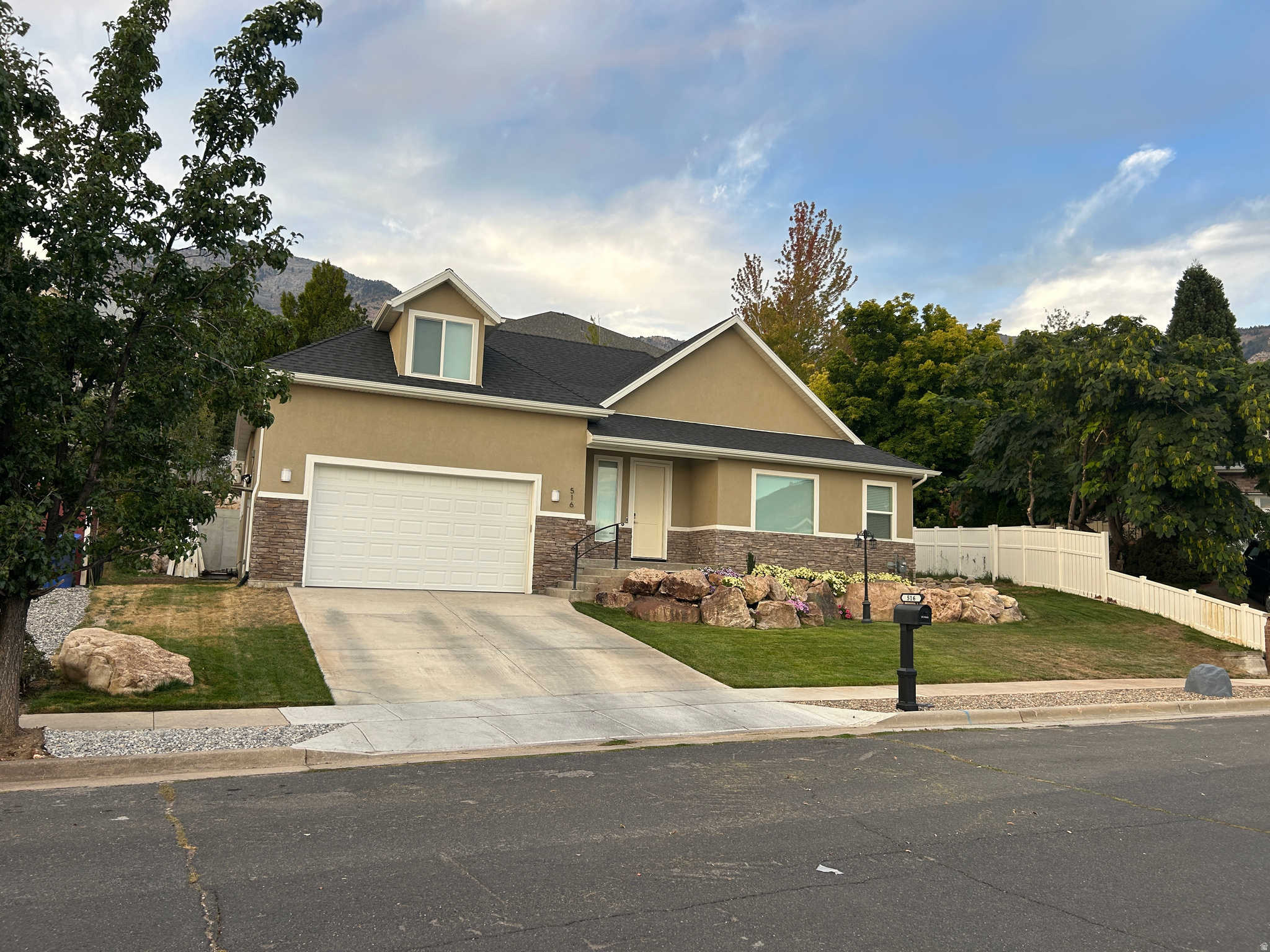 Stunning North Ogden Home with Exceptional Features, Mountain and Valley Views -- Vacant -- Move-In Ready! Discover this beautiful 4-bedroom, 3 full | 2 half bath home offering 3,710 sq. ft. of thoughtfully designed living space on a 0.20-acre lot. The open-concept main floor is perfect for entertaining, while the fully finished basement with 9-foot ceilings provides generous space for family, guests, a home theater, or recreation. A standout feature is the massive walk-in safe, offering exceptional storage, security, and peace of mind. Outside, enjoy a beautifully landscaped, partially fenced yard, an oversized 2-car garage, and breathtaking mountain views in a peaceful North Ogden neighborhood.  Vacant and move-in ready, this exceptional home is ready for its next owner to enjoy from day one. Combining spacious living, quality finishes, and everyday convenience, this is a rare opportunity you won't want to miss.  Square footage figures are provided as a courtesy estimate only and were obtained from Weber County Records. Buyer is advised to obtain an independent measurement.