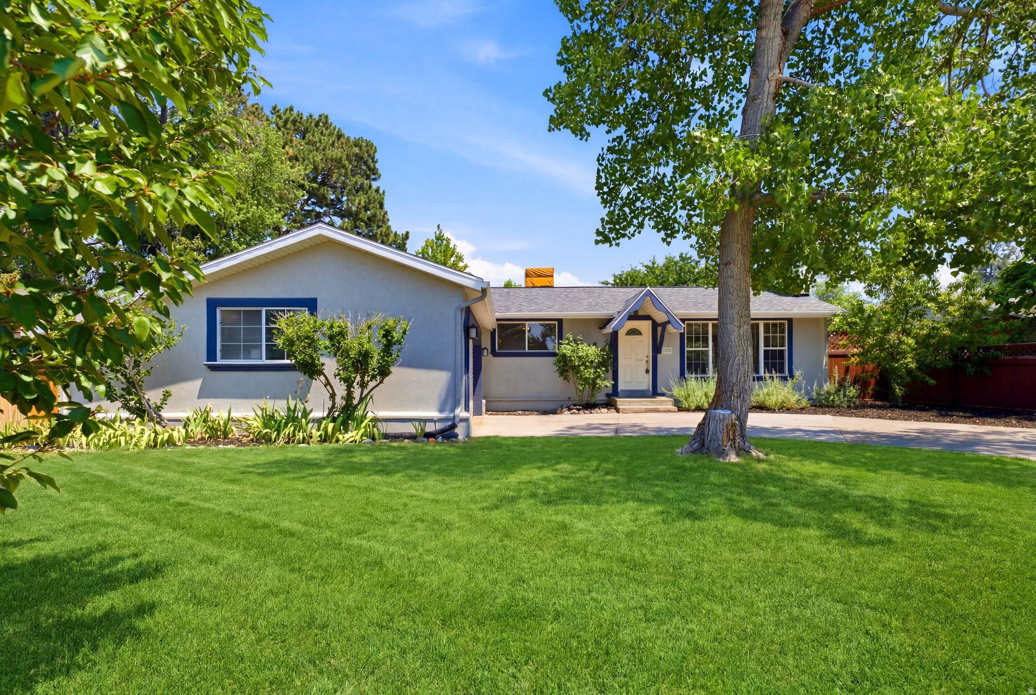 Charming home in the heart of Cottonwood Heights!!  Home comes with a unique tradition to home owners, a scrapbook that is passed down from owner to owner showing the evolution of the home from the beginning and those who have made generational memories inside of it.  ONE OF A KIND!!!  Home with 4 bedrooms and 3 newly remodeled bathrooms sits back from roadway to create your own retreat with beautiful mountain views and minutes from either Big or Little Cottonwood Canyon that provides easy access with walking distance to Cottonwood Heights rec center, Butler elementary and Jr. High. and nearby Brighton High School.  This amazing well kept Rambler f with amazing hard wood floors newly refreshed, newly remodeled bathrooms, a patio perfect to entertain and mountain views to die for.  New roof in 2020, Central air new in 2024, patio installed 2023, Swamp cooler was replaced in 2020 as well.   Property provides large RV parking behind or in front of back yard fencing.  Home information is provided as a courtesy to the buyer, buyer to verify all information.