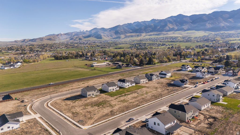 Discover the opportunity to build in Smiling H, a premier North Logan community designed for easy, everyday living. These fully improved, flat homesites offer a more efficient build experience and feature secondary irrigation, along with high-speed fiber internet available through the HOA. Enjoy a walkable lifestyle with nearby parks, trails, sports amenities, and quick access to Utah State University, downtown Logan, and year-round recreation. With its ideal location, easy access in all seasons, and peaceful neighborhood setting, Smiling H is the perfect place to bring your vision to life! Explore options with our amazing Builder or bring your own builder. Call us today for more information!
