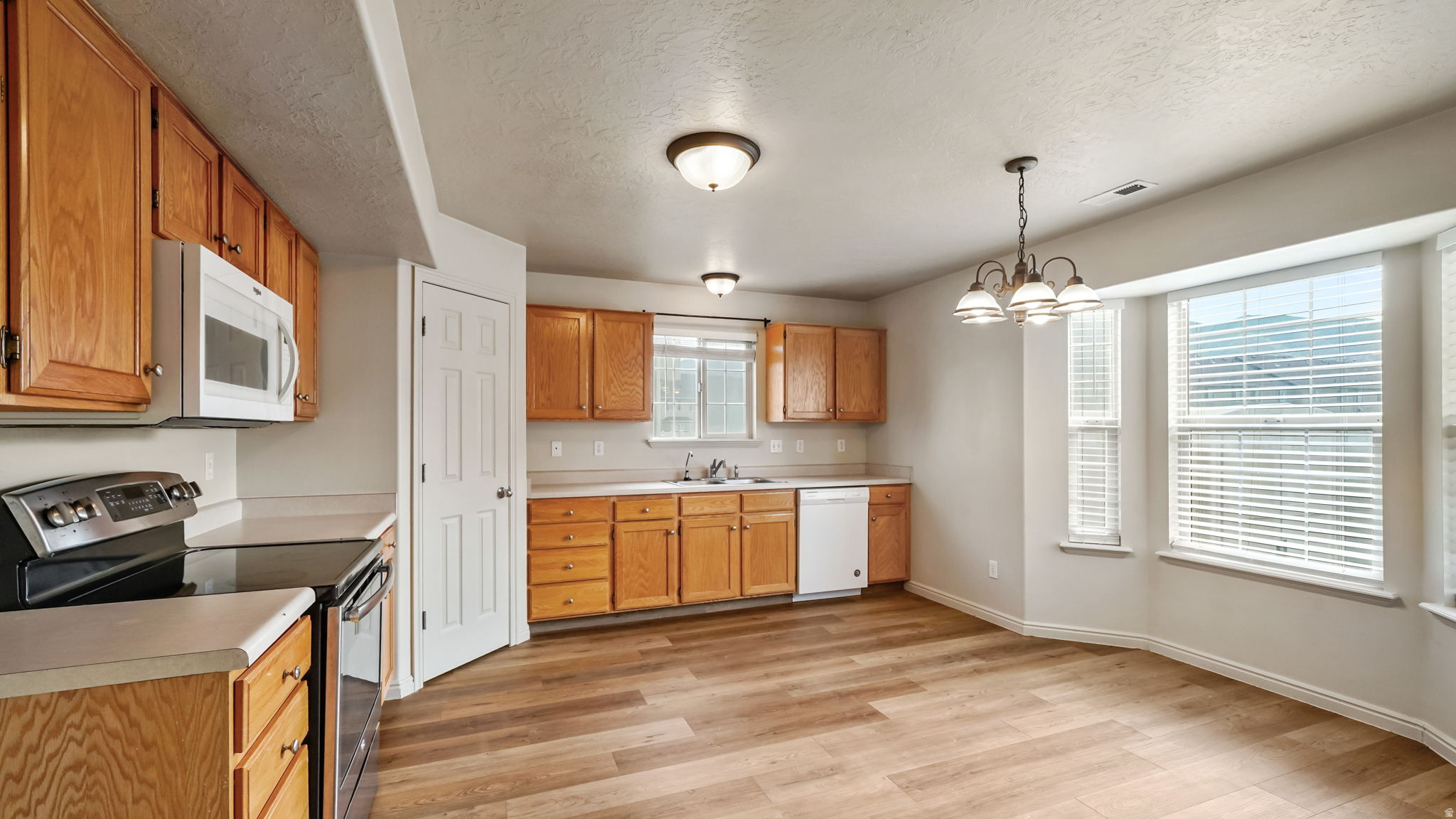 TOWNHOMES AT CAMELOT VILLAGE - Residential