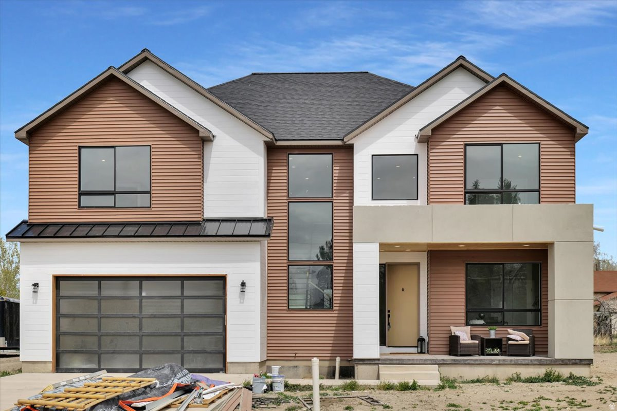 INSTANT EQUITY on new construction? Yes, you read that right. A recent builder appraisal shows that at the current list price, buyers step in with immediate value. Welcome to Mount Pleasant's truest standout home; fully finished, fully move-in ready, and anything but a typical new build. This is modern mountain living with elevated design, clean lines, and the kind of detail you usually only see in high-end builds. From the moment you walk in, the open-to-above ceilings and natural light create a true wow factor. The layout flows effortlessly, complemented by 10-foot ceilings, oversized windows, solid-core doors, and a modern aesthetic that feels both refined and comfortable. The kitchen absolutely delivers with custom cabinetry, quartz countertops, large pantry, and gas hookups, ready for everyday living or entertaining. The main living space centers around a sleek ember fireplace, while the cable-railing staircase adds a sharp architectural edge. Upstairs, the primary suite is a full on retreat! Featuring a freestanding tub, frameless glass rainfall shower, and a spa-like atmosphere. Comfort and efficiency are dialed in with separate heating and cooling zones for each level of the home and a tankless water heater for efficiency. Step outside to a stamped concrete patio built for entertaining, with lighting that sets the tone for summer nights, gatherings, and everything in between. Here's the bottom line: homes like this don't come around often in Mount Pleasant, not at this level of design, finish, presence and definitely not at this price! It's not just another new build; it's the one that sets the new standard. Schedule your private showing today before it's gone. Square footage figures are provided as a courtesy estimate only and were obtained from Building Plans.  Buyer is advised to obtain an independent measurement.
