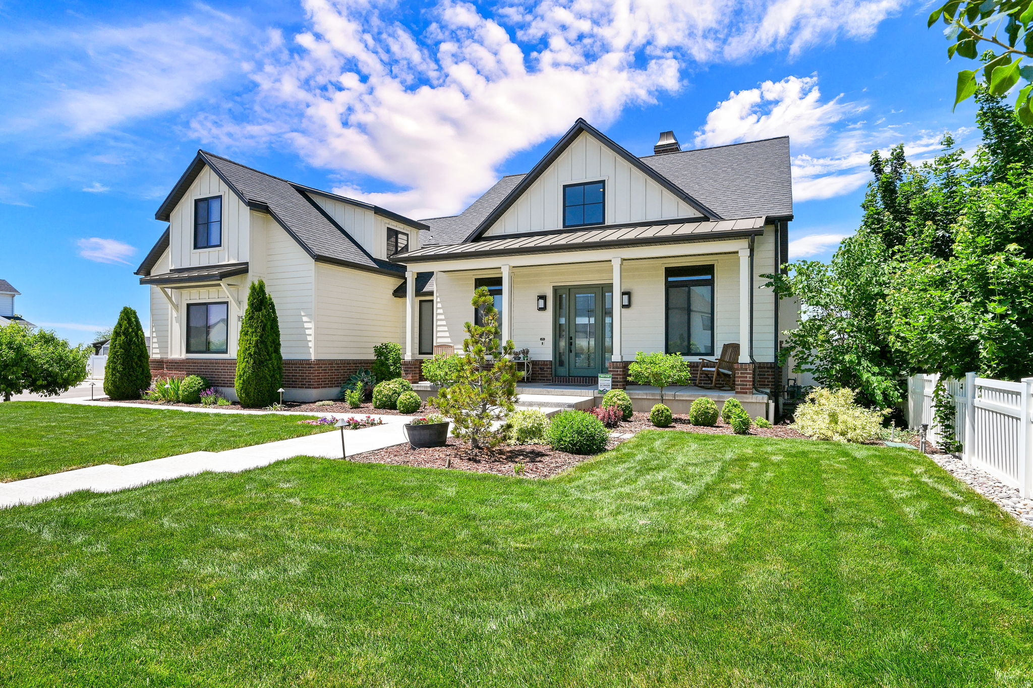 From the moment you arrive at 151 N Welden Way, you're welcomed by a home that feels bright, spacious, and thoughtfully designed for comfortable everyday living. This custom-built residence features three generously sized bedrooms, each with a walk-in closet, a private office with glass French doors, and two and a half bathrooms. The single-level layout offers both convenience and style, with extra-wide hallways and doorways that enhance the open feel. Throughout the home, the soaring vaulted ceilings adds to the sense of light and elegance. At the heart of the home, a chef-inspired kitchen showcases custom cabinetry, a gas stove, and a butler's pantry that provides added storage and prep space-ideal for entertaining or hosting larger gatherings. The kitchen flows seamlessly into the inviting living area, where a fireplace and ambient lighting create a warm, elevated atmosphere. Above the garage, an additional 565-square-foot bonus space offers flexibility for a game room, playroom, family room, or potential fourth bedroom. The unfinished walk-out basement adds even more opportunity, with approximately 2,800 square feet ready for you to design and customize to fit your needs. Outside, enjoy peaceful mornings on the covered patio with no backyard neighbors, harvest fresh fruit and vegetables from your garden, and gather with family and friends in the beautifully designed backyard featuring a gas fire pit for those cozy nights.