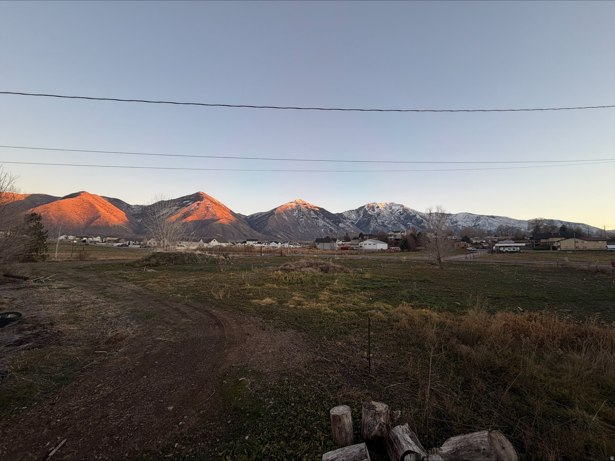 $15k PRICE DROP. Seller is motivated!  Enjoy picturesque mountain views and memorable sunsets that are part of daily life in this area of Salem.  Larger lot with a flat usable footprint is ideal for a custom home with room for a yard, shop, or additional storage.  Seller is also willing to build (or bring your own), giving buyers the option to purchase outright or explore a build-to-suit opportunity.  Located minutes from schools, parks, and everyday conveniences with no HOA.