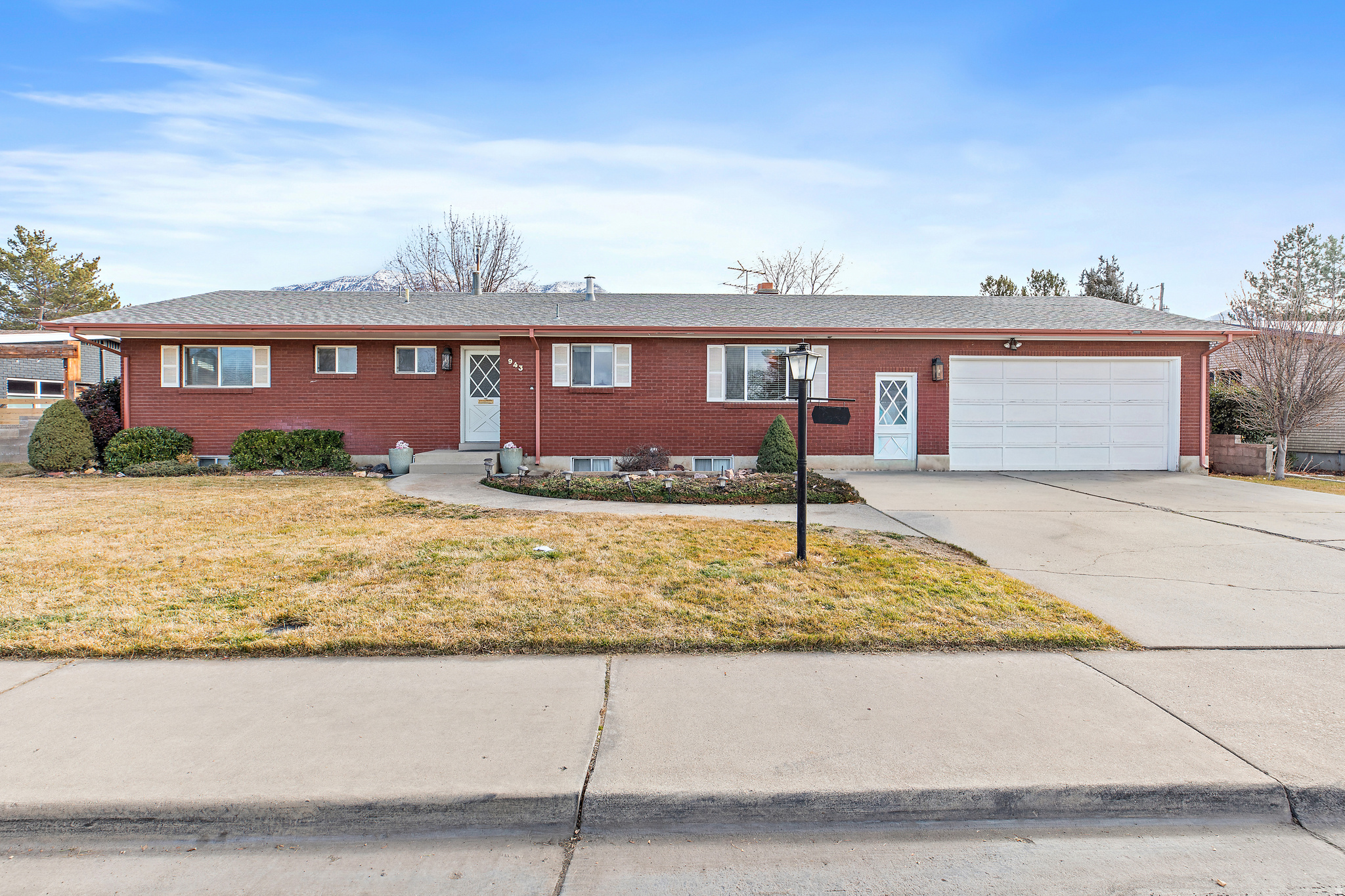 Extremely well maintained brick home in established Orem neighborhood. All bathrooms have been beautifully remodeled within the past 2 years, plus an updated kitchen and a functional floor plan featuring multiple gathering spaces and basement living area. Laundry conveniently located in the primary bath and multiple dedicated storage spaces throughout. Enjoy the covered patio and fully fenced yard with mature landscaping on a spacious lot-perfect for relaxing or entertaining. Ideally located near schools, parks, shopping, and freeway access. Move-in ready. Partially furnished and washer and dryer included.