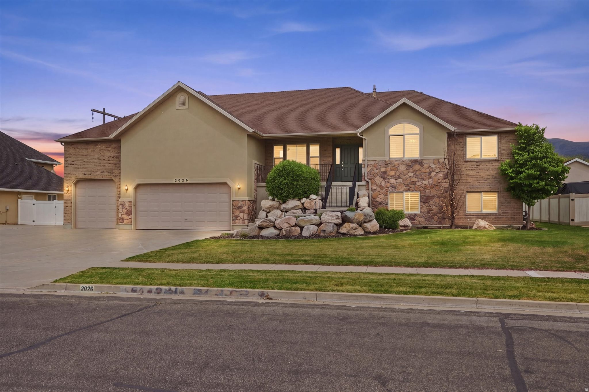 Gorgeous remodeled home in the heart of Farmington with space, style and flexibility!  The open and inviting gathering area is perfect for everyday living and entertaining.  The beautiful kitchen features quartz countertops, white cabinets, two pantries and tasteful tile flooring.  The spacious primary suite offers a grand bathroom and large walk-in closet.  You'll love the updated lighting, charming mud room, newer tankless water heater, water softener and plenty of storage, including cold storage.  The massive garage easily fits large vehicles and toys, plus there's extra RV parking and a storage shed.  Step outside to a dream backyard with a covered patio, firepit, in-ground trampoline and basketball court.  Need multi-generational living or rental potential?  This home offers ADU or mother-in-law suite possibilities, along with a flexible office or living room space and beautiful shutters throughout.  Convenient location near freeway access, shopping and trails.