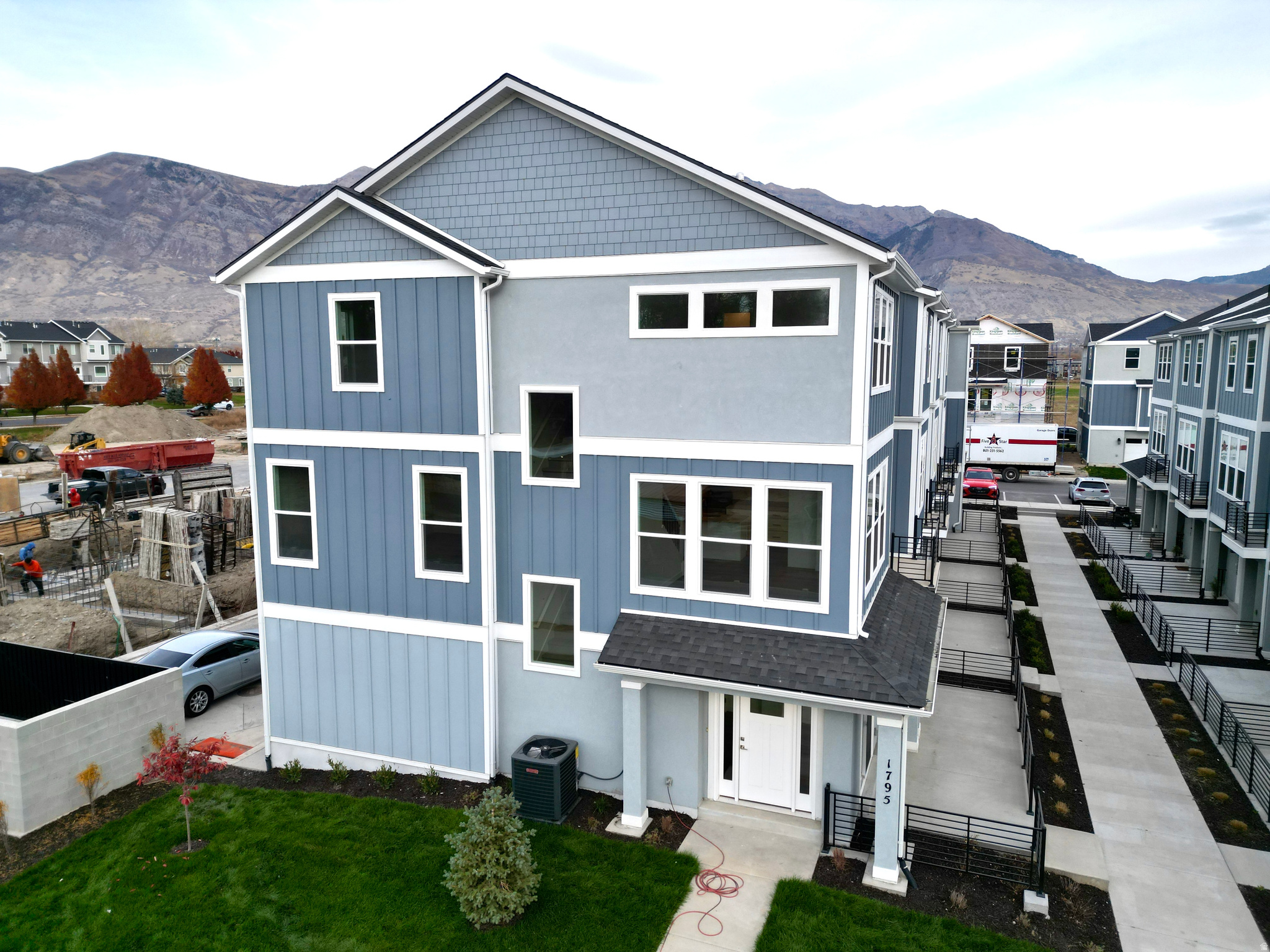 One of the last end units remaining-act now before it's gone!  Tayside Farm, located in Pleasant Grove. This end-unit Hastings floor plan is thoughtfully designed for comfort, light-filled living, and modern convenience. This home is finished and ready for a new homeowner. Enjoy a quiet setting with stunning mountain views and convenient access to I-15, shopping, dining, and entertainment. The open-concept main level features oversized windows, abundant natural light, and seamless flow between the kitchen, living, and dining areas. The kitchen offers generous cabinet space and a large pantry. Step out onto the private deck just off the main living area-perfect for grilling, relaxing, and enjoying the views. Upstairs, the primary suite provides a peaceful retreat with a spa-like bathroom featuring a separate soaking tub and shower, dual vanities, and a large walk-in closet. Two additional bedrooms, a full bathroom, and a convenient upper-level laundry room complete the second floor. Seller reserves the right to accept any offer at any time. Taxes TBD. Square footage figures are provided as a courtesy estimate only and were obtained from builder plans; buyer is advised to obtain an independent measurement.