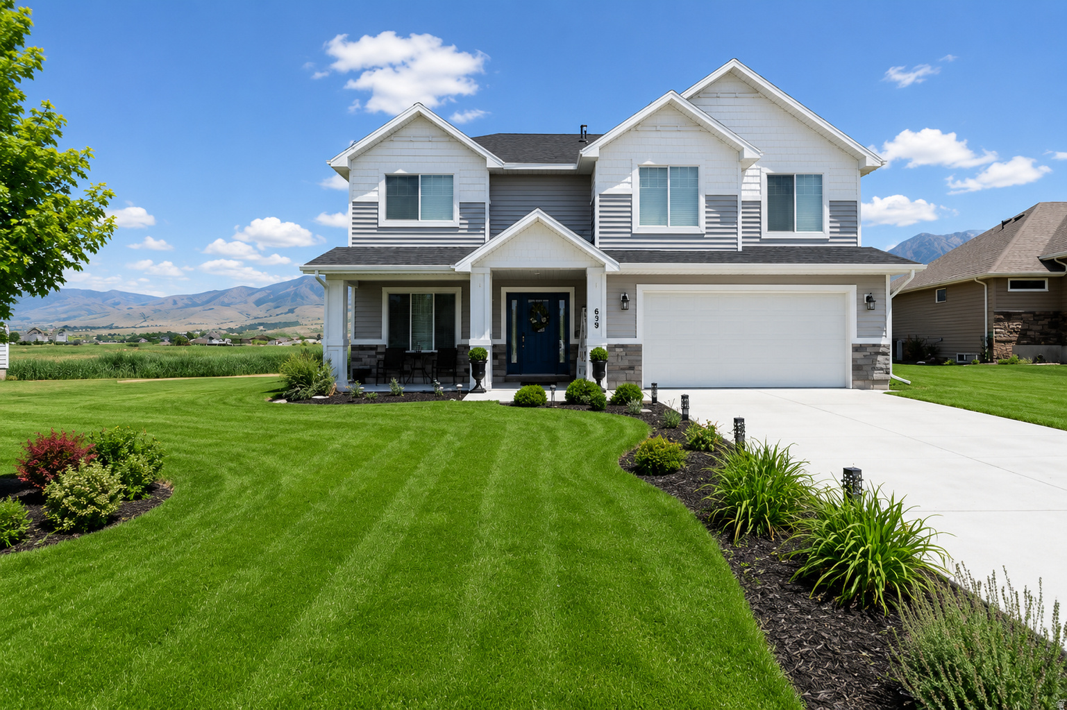 Welcome home to this beautiful two-story residence built in 2020, offering the perfect blend of modern comfort and functional living. Featuring 4 spacious bedrooms, 2.5 bathrooms, and large family rooms on both levels, there's plenty of space for gathering, entertaining, and everyday living. The versatile main-level office/den provides the ideal space for remote work, hobbies, or a playroom. Thoughtfully designed with comfort and convenience in mind, this home offers inviting living spaces throughout. Step outside to enjoy the backyard retreat, where stunning mountain views, peaceful water views, and abundant bird watching create a serene setting for relaxing on the patio. Don't miss the opportunity to own this exceptional home in a beautiful location. Square footage measurements were take from assesor's records and provided as an estimate only.
