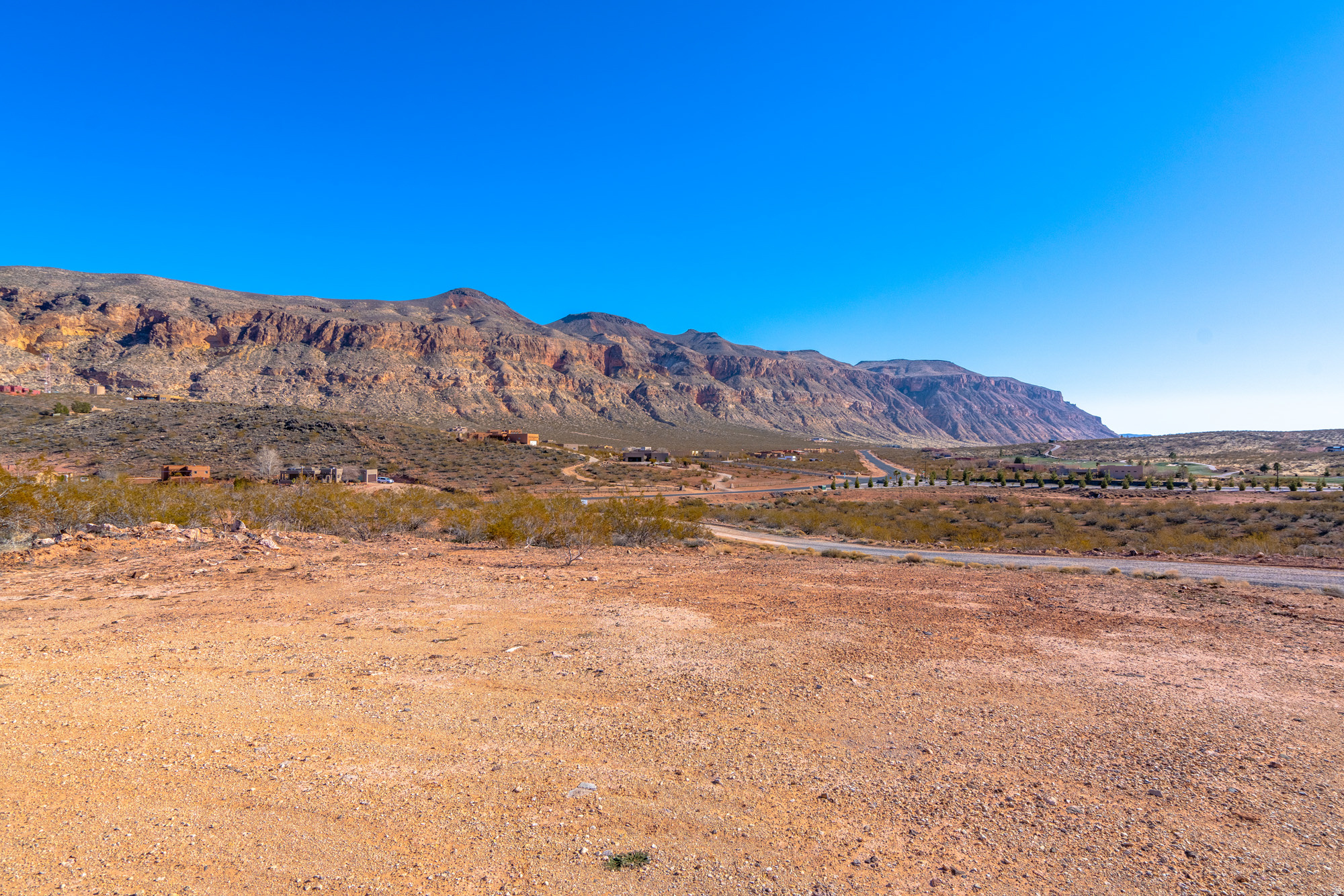 A rare land opportunity in one of Southern Utah's fastest-growing lifestyle destinations. Offering approximately 15 acres across multiple tax IDs, this property is ideally located just minutes from Zion National Park and Sand Hollow State Park, and directly adjacent to the award-winning Copper Rock Golf Course. With exceptional scenery and convenient access to premier recreation and amenities, the site is well suited for a luxury residential community, large-acre estate lots, or a signature development project. With a preliminary plan already available, the acreage provides a flexible canvas for a variety of architectural styles and layoutswhile still allowing buyers to bring their own vision and design team. Expansive natural surroundings, panoramic mountain and cliff views, and quick access to outdoor recreation make this a high-demand location for today's buyers seeking space, privacy, and connection to nature. Making this an appealing choice for both local and out-of-state buyers looking for a scenic yet accessible retreat. The region's rising market interest, strong tourism economy, and premium view corridors create a compelling long-term investment with excellent resale potential. Opportunities like thissize, views, adjacency to golf, and recreation accessrarely become available. Secure your foothold in one of Southern Utah's most desirable growth areas and bring your development vision to life.