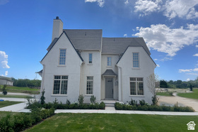 Use the builder's preferred lender, Security National, and receive $5,000 toward closing costs or upgrade credit! Welcome to this charming townhome in Camden Commons, a Goodboro Community located on the northern edge of Herriman. Inspired by London's garden suburbs, this English-style hamlet is thoughtfully designed around a shared green space and features beautiful architecture by Bradford R. Houston Design Studios. Inside, the home offers 3 upstairs bedrooms, including a deluxe primary suite with custom cabinetry, quartz countertops, and distinctive hardware. The main floor showcases a spacious kitchen with high-end finishes and a generous dining space, perfect for everyday living or entertaining. Option for a small private fenced backyard. Camden Commons is ideally situated near shopping, restaurants, and schools. Private showings available-call today!