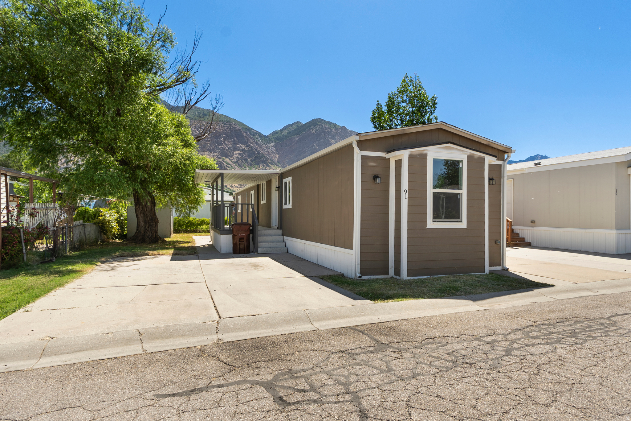 Newly remodeled 3-bedroom, 1.5-bathroom mobile home featuring a functional floor plan and comfortable living space. The home offers three spacious bedrooms, a full bathroom plus a half bath for added convenience, and an open living area. The kitchen provides ample cabinet and counter space with room for dining. Bedrooms are well sized with good separation for privacy.  Square footage figures are provided as a courtesy estimate only and were obtained from County Records.  Buyer is advised to obtain an independent measurement.
