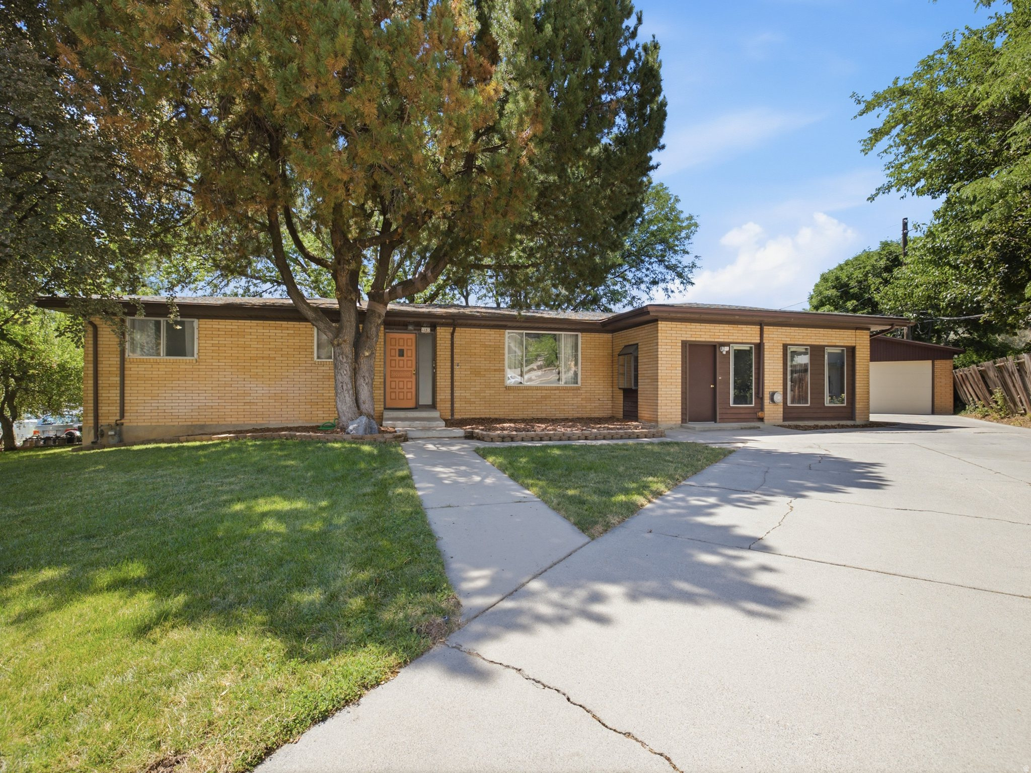 Welcome to this beautiful 3,800 sq ft rambler offering room for everyone! Home boasts 6 bedrooms, 3 bathrooms, tasteful updates throughout, a brand new kitchen, and an open functional layout! Gorgeous .33 acre backyard, with large mature shade trees, and property also has 1/22 ownership of vacant lot 2 door downs for additional outdoor space. Location is ideal! Located in one of the area's most desirable neighborhoods, this home puts you minutes from Brigham Young University, minutes to Provo Canyon, and only 15 minutes to Sundance Ski Resort. Outdoor enthusiasts will love the easy access to stunning mountain trails perfect for hiking, biking, and year-round adventure. Come to the open house on Saturday, July 25 from 11:00 am -1:00 pm, or schedule your private showing!