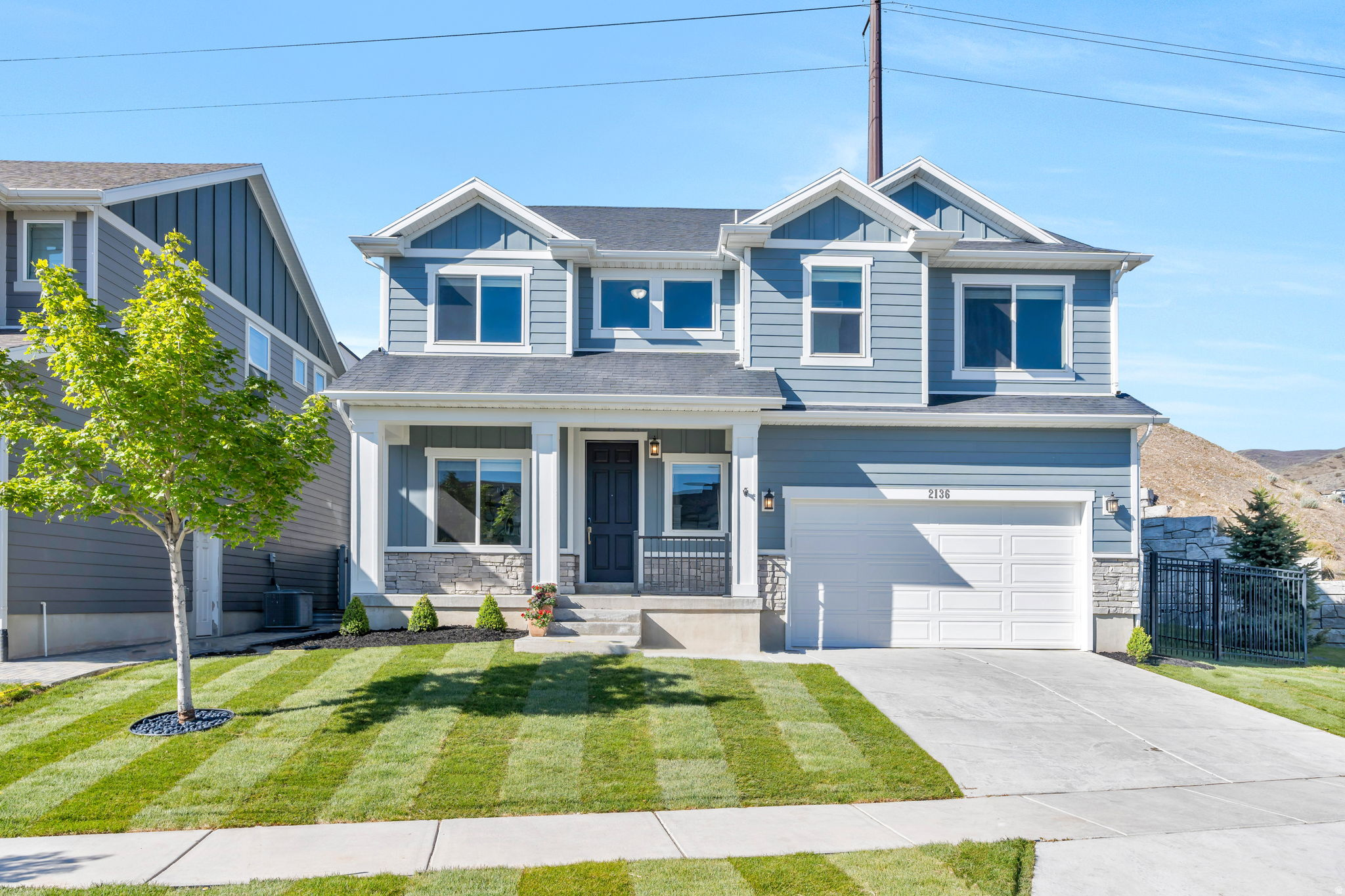 An exceptional opportunity in the highly sought-after Traverse Mountain community-this beautifully appointed 4-bedroom, 2.5-bath residence offers a refined blend of style, comfort, and modern living. Thoughtfully upgraded throughout, the home features matching quartz countertops, an impressive oversized island that anchors the kitchen, and expansive windows that flood the interior with natural light. The spacious primary suite serves as a private retreat, complete with a well-appointed ensuite bath featuring a large shower designed for relaxation. Just beyond the primary suite, a versatile loft area provides additional living space-perfect for a second family room, office, or flex space to fit your needs. Every detail has been carefully curated to create a seamless balance of elegance and functionality. Step outside to a fully fenced yard with newly installed grass, offering a private setting ideal for both quiet evenings and entertaining. Perfectly positioned next to the community park and playground, and just moments from scenic mountain biking, hiking, and walking trails, the location enhances both lifestyle and convenience. Residents of Traverse Mountain enjoy a lifestyle defined by recreation and accessibility, with resort-style amenities including a pool, clubhouse, tennis courts, parks, and miles of trails-all while being minutes from premier shopping, dining, and freeway access. Square footage figures are provided as a courtesy estimate only and were obtained from county records. Buyer is advised to obtain an independent measurement.