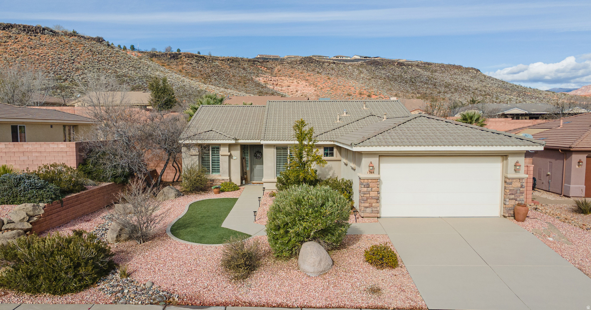 Experience the comfort and convenience of this beautiful, move-in-ready home located in the highly sought-after Coral Canyon community. Recently updated with new carpet and fresh paint, the home features stunning granite countertops that add an elegant touch throughout. With three bedrooms and two bathrooms, the spacious 1,780 square feet provide plenty of room for living while remaining easy to maintain.