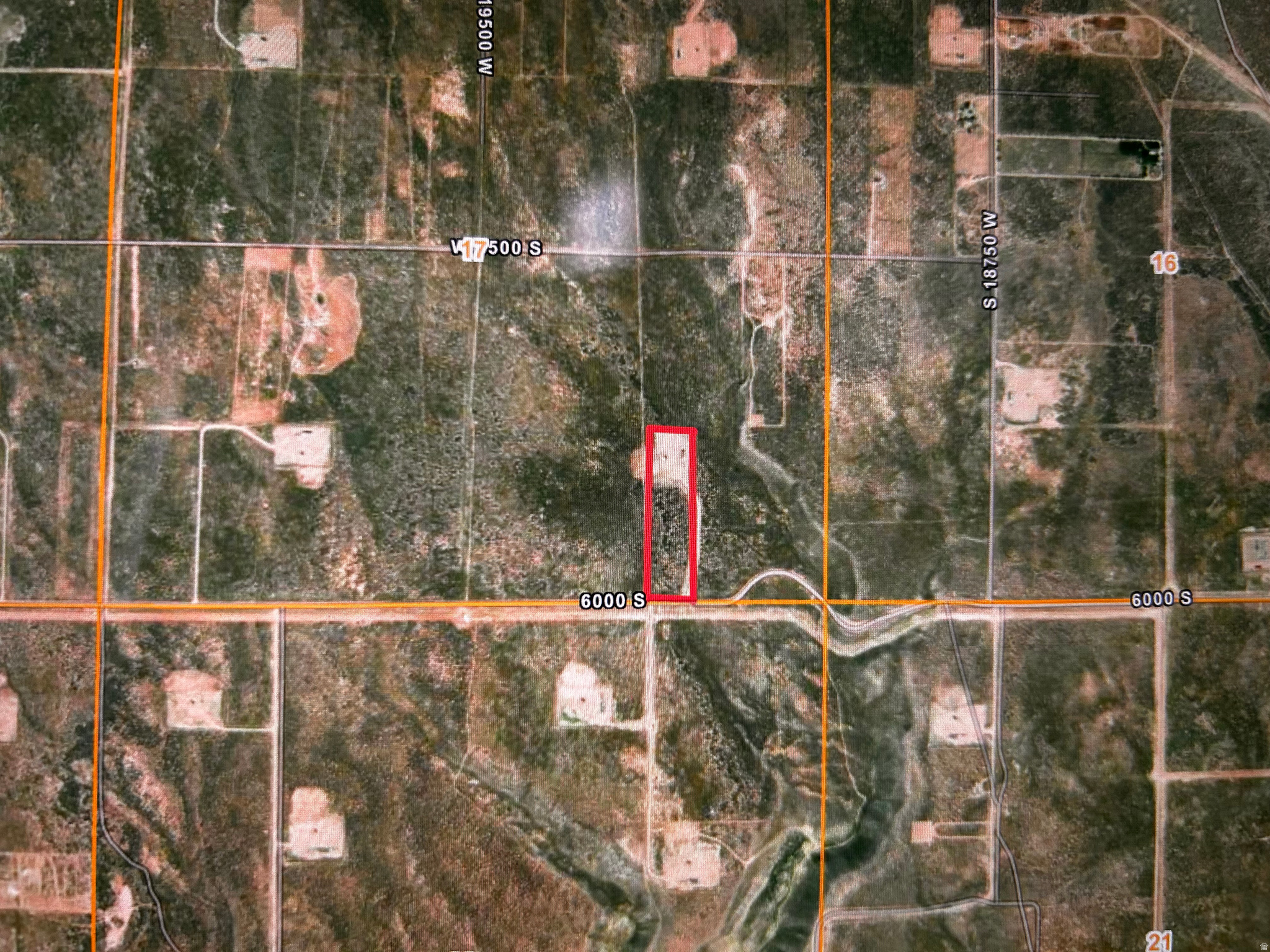 10.03 acres!  North of Duchesne, then east on 6000 South for a mile or so. This one has an oil site on it.  Seller does not own mineral or subsurface rights included.   However, it is close to town and has amazing panoramic views of our mountain ranges. Wildlife abounds and the back roads are so great for adventurers. With 10 acres, there is plenty of room to camp!  Easy to find!