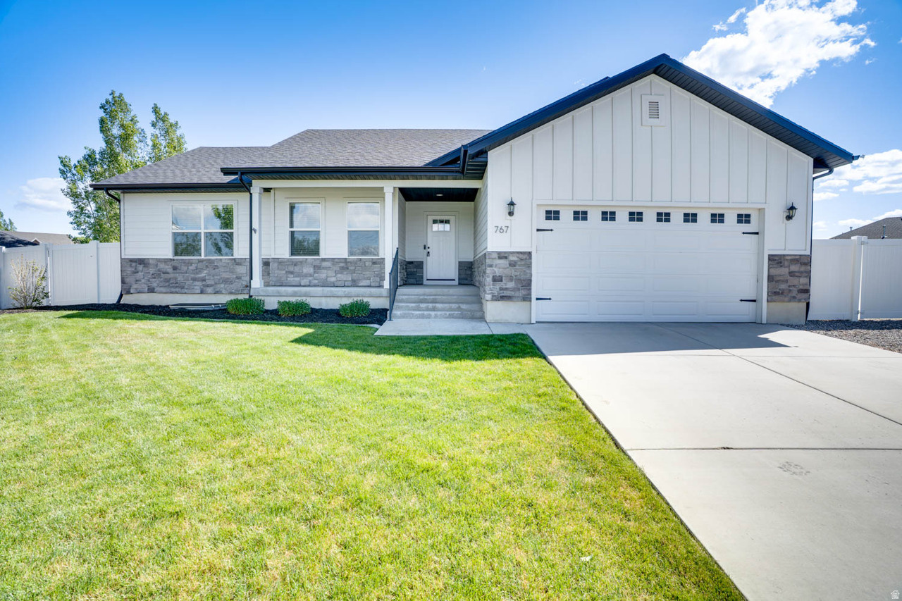 Stunning Heber Valley rambler offering the perfect blend of comfort and mountain living. Surrounded by breathtaking views, this beautifully designed 5-bedroom, 3-bath home features an open-concept layout with vaulted ceilings, abundant natural light, and spacious gathering areas ideal for entertaining or everyday living. Built in 2018-2019 with quality craftsmanship and modern finishes throughout, the home includes a fully finished basement with flexible space perfect for guests, multi-generational living, a home office, gym, or media room. The thoughtfully designed floor plan provides both functionality and style at every turn. Step outside to a beautifully maintained yard featuring an in-ground trampoline, swing set, raised garden beds, and mature fruit trees--creating the perfect setting for outdoor enjoyment. Perfectly located within walking distance to the elementary, middle and high school and just minutes from charming local restaurants, shopping, reservoirs, golf, world-class ski resorts, and countless outdoor adventures. This location truly has it all. An attached garage and generous fenced side yard provide ample space for recreational vehicles, trailers, and outdoor gear. Nestled in one of Heber Valley's most sought-after neighborhoods, this exceptional property offers the lifestyle you've been waiting for.