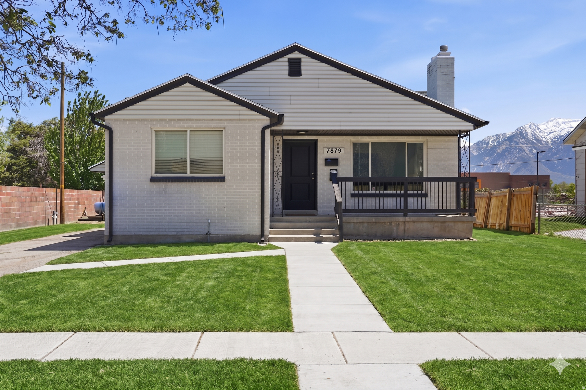 *The Seller is offering a credit to add brand-new sod to the entire yard!* This fully occupied non-conforming duplex with a mother-in-law apartment offers strong rental potential and flexible living options. The property is currently rented month-to-month for $2,550, providing immediate income while still allowing a buyer the option to occupy the home if desired. Previously, the home was rented separately for $1,650 upstairs and $1,350 downstairs, generating $3,000 per month in total rental income, making it an attractive opportunity for investors or house hackers. Both units feature updated kitchens, giving the property a clean, modern feel for tenants or owner-occupants. Major updates include a newer roof and air conditioning system replaced just a few years ago, helping reduce near-term maintenance costs. Conveniently located with easy access to the freeway, TRAX, schools, shopping, and everyday amenities, this property offers both strong rental appeal and practical convenience. Whether you're looking for a cash-flowing investment property, a home where you can live in one unit and rent the other, or just a home with two full kitchens, this property provides flexibility and long-term potential. *The Seller is offering a credit to add brand-new sod to the entire yard.* Some photos have been enhanced using ai to show what the yard would look like with new sod and updated decor.