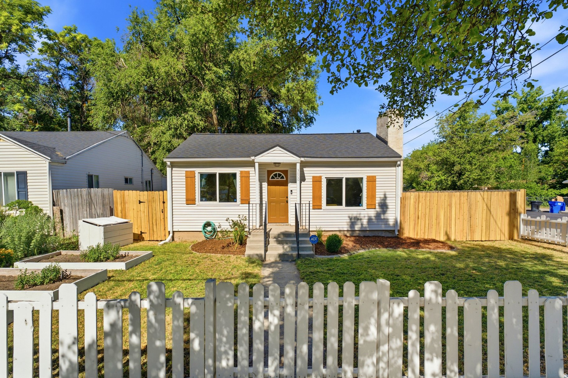 Tucked on a large corner lot in South Salt Lake, near the Millcreek border, this home offers the hard to find combination of major system updates, outdoor space, and room to make it your own. The expensive work is already done!  With newer triple-pane windows, roof, furnace, and water heater, this home is worry free. A modern mini-split system and energy-efficient windows help keep utility costs low year round. Outside, the fully fenced backyard is built for entertaining and adventure alike, featuring a spacious deck, fire pit area, garden boxes, detached garage, and gated RV parking. It's the space, privacy, and flexibility you've been looking for. Just minutes from Sugar House, Nibley Park Golf Course, Meadowbrook TRAX, and easy freeway access, this is a move-in-ready opportunity in one of Salt Lake's most convenient locations.