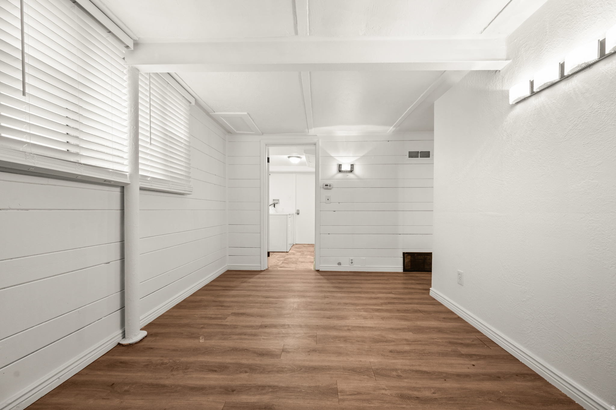 PRICE REDUCED! Triplex with PRIVATE Bungalow! Tenants pay ALL UTILITIES and do snow removal. Zero-scaped property is low cost and low maintenance. Roof replaced in 2020 and on back building in 2022.  REMODELING IN BASEMENT UNIT. Updated W/D in #1 & #2. New AC in #1. #3 has new floors and appliances. New paint in #1, #2, & #3. Convenient to freeways and businesses, but on a quiet street. Yearly leases, but tenants could be removed for owner-occupied purchase.