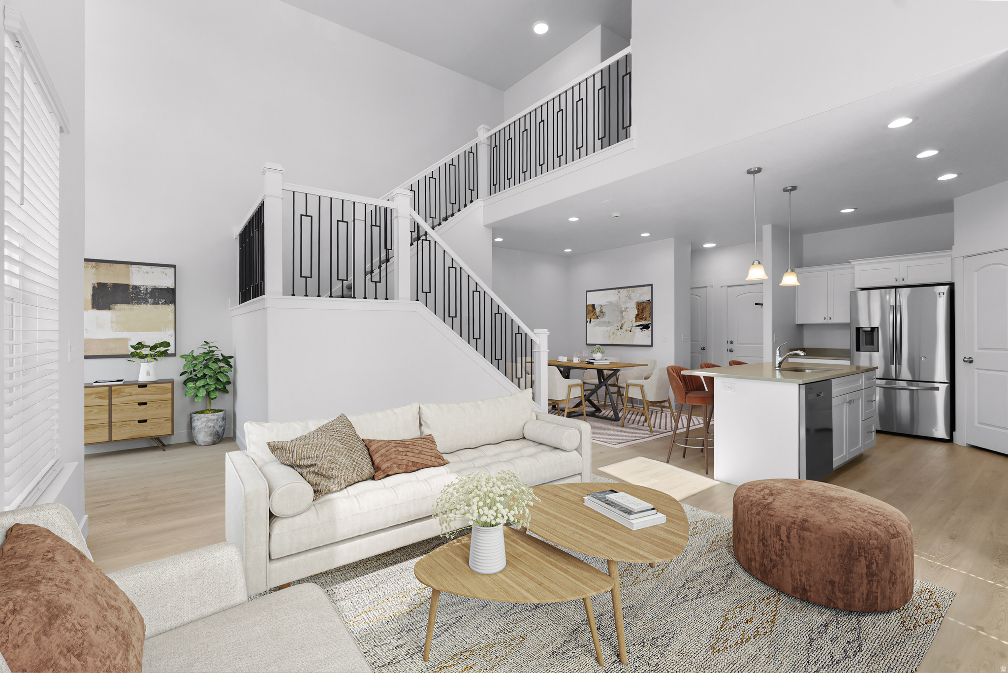 New Big Price Cut + Move in Ready! *Total Rents were $3,590!!* Rare 5 bedroom END UNIT townhome with a basement kitchenette that truly feels like a single family home. This home offers 5 bedrooms, 3.5 bathrooms, and a fully finished basement, including 2 large bedrooms + kitchenette setup (fridge, sink, counter space, and room for a microwave) ideal for rental potential, flexible living or guests, . Located directly across from grassy open space, extra parking, and the clubhouse, giving it a more open, convenient setting than most. End unit positioning brings in great natural light, added privacy, and a quieter feel, while the extra tall 2 car garage + additional storage space is a rare bonus. Previously configured to generate $3,590/month in rental income Low HOA with landscaping included, XL clubhouse with extra parking, a pool, gym, playground, pickleball and basketball courts. Conveniently located near 2100 N, I-15, shopping and Silicon Slopes. Buyer is responsible to verify square-footage and all other information. Make sure to check out the Virtual 3D Tour to see the full space.