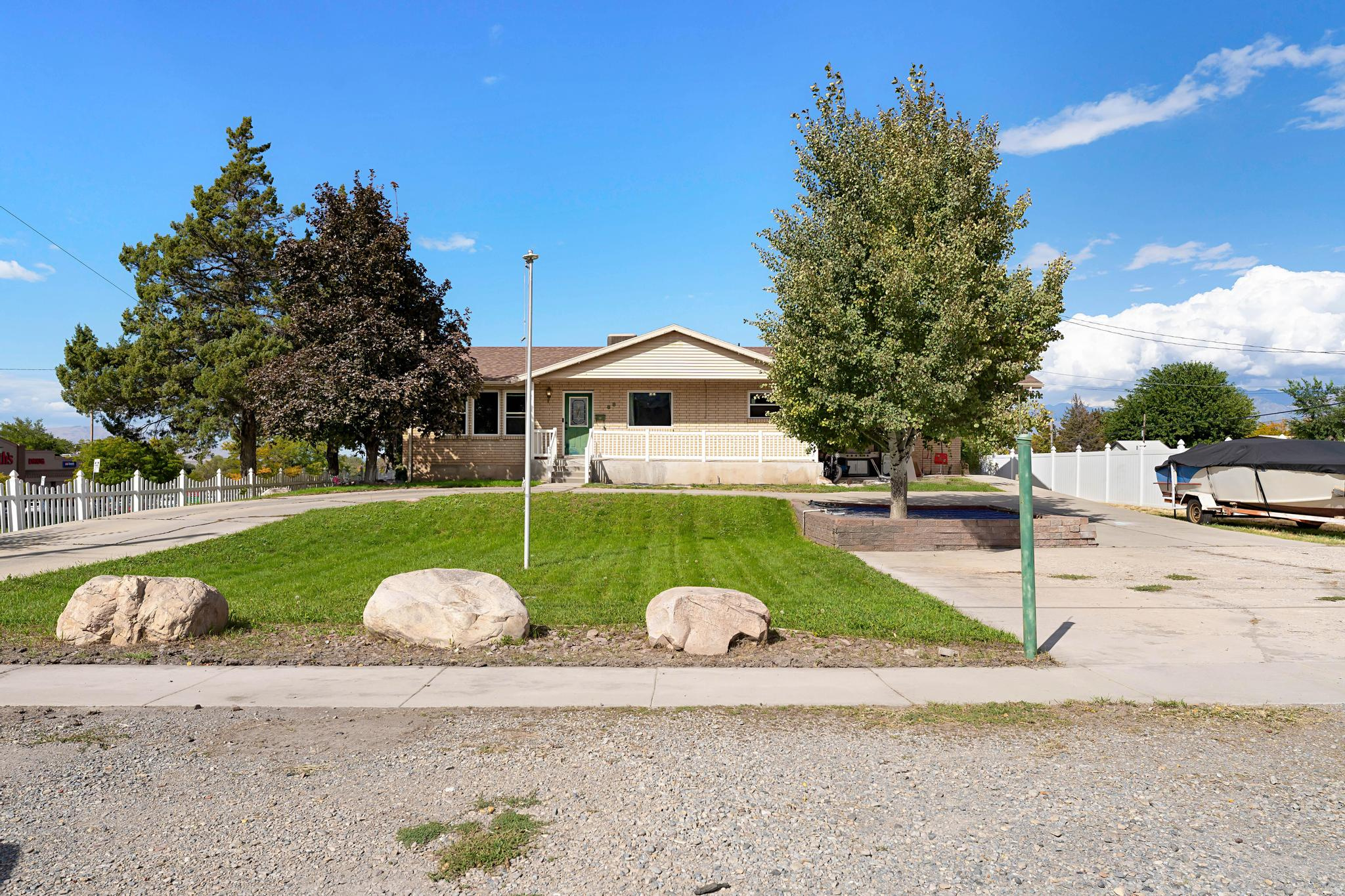 Offering $4,000 in concessions when buyer uses preferred lender! Or ask about the VA 5.25% assumable loan option, a rare opportunity in today's market! Perfectly positioned in the heart of Payson, this home puts you right in the middle of everything the city has to offer. You're just 4 minutes from the freeway, across the street from Smith's Food and Drug, and less than a mile from local schools, community parades, the city pool, and more - because convenience should be part of the package. Inside, you'll appreciate all new windows installed within the last two years, designed to unlatch and pull down for easy cleaning inside and out. The solar power system helps keep those electricity bills in check, leaving you with a little extra room in the budget for the fun stuff. Parking? Bring it all. Between the wrap-around driveway, front RV parking, rear gate access to MASSIVE RV/trailer parking, and plenty of additional space, there's room for the RV, the boat, the trailer... and probably your neighbor's if you're feeling generous. Sitting on a spacious .39-acre lot, you'll have plenty of room to bring your outdoor dreams to life with gardens, toys, gatherings, or that backyard project you've been pinning on Pinterest. As for those extra storage needs, the basement features a spacious cold storage room perfect for food storage, bulk shopping hauls, holiday supplies, or all the things you definitely needed from that last warehouse run. Either way, you'll have plenty of room to keep everything organized and out of sight. Buyer is advised to obtain an independent measurement.