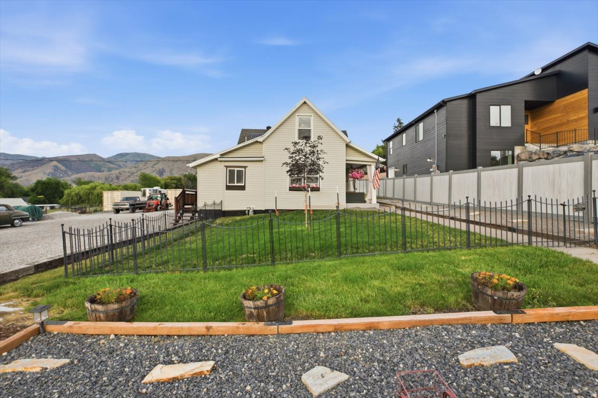BACK ON THE MARKET!! NOW IS YOUR CHANCE Fully updated home on over 1 acre in the heart of Hyrum! Priced at $415,000 this 2-bedroom 1-bath home features a beautifully remodeled kitchen and living area, fully paid-off solar panels, a detached garage, workshop, and two shipping containers for additional storage. Enjoy ample parking for RVs, trailers, and trucks, plus animal rights with plenty of room for horses and other livestock. Don't miss this rare opportunity to own acreage with space, storage, and convenience all in one property. Schedule your showing today!