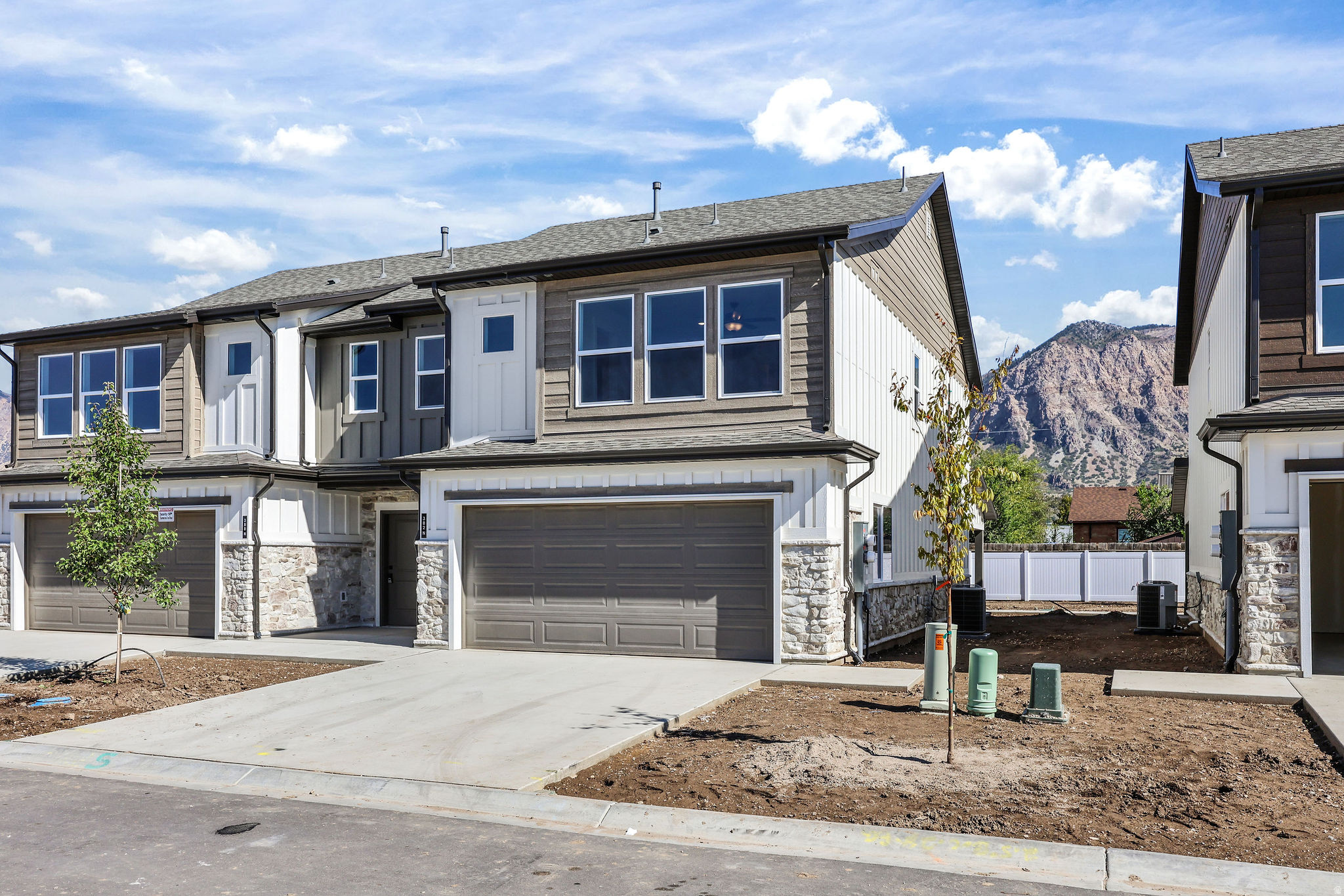 Beautiful new townhome community with a large 2-car garage! This listing is for the UNIT 25. Loaded with upgrades! Custom cabinetry, tile backsplash, LVP flooring, stainless steel appliances, craftsman styling on exterior finish & interior doors & trim, upgraded plumbing & lighting fixtures, walk-in-closet w/ organizers, marble window sills, belt-driven quiet garage door, covered patio, & much more! Square footage figures are provided as a courtesy. DONT MISS THIS OPPORTINITY! Buyer to verify all.