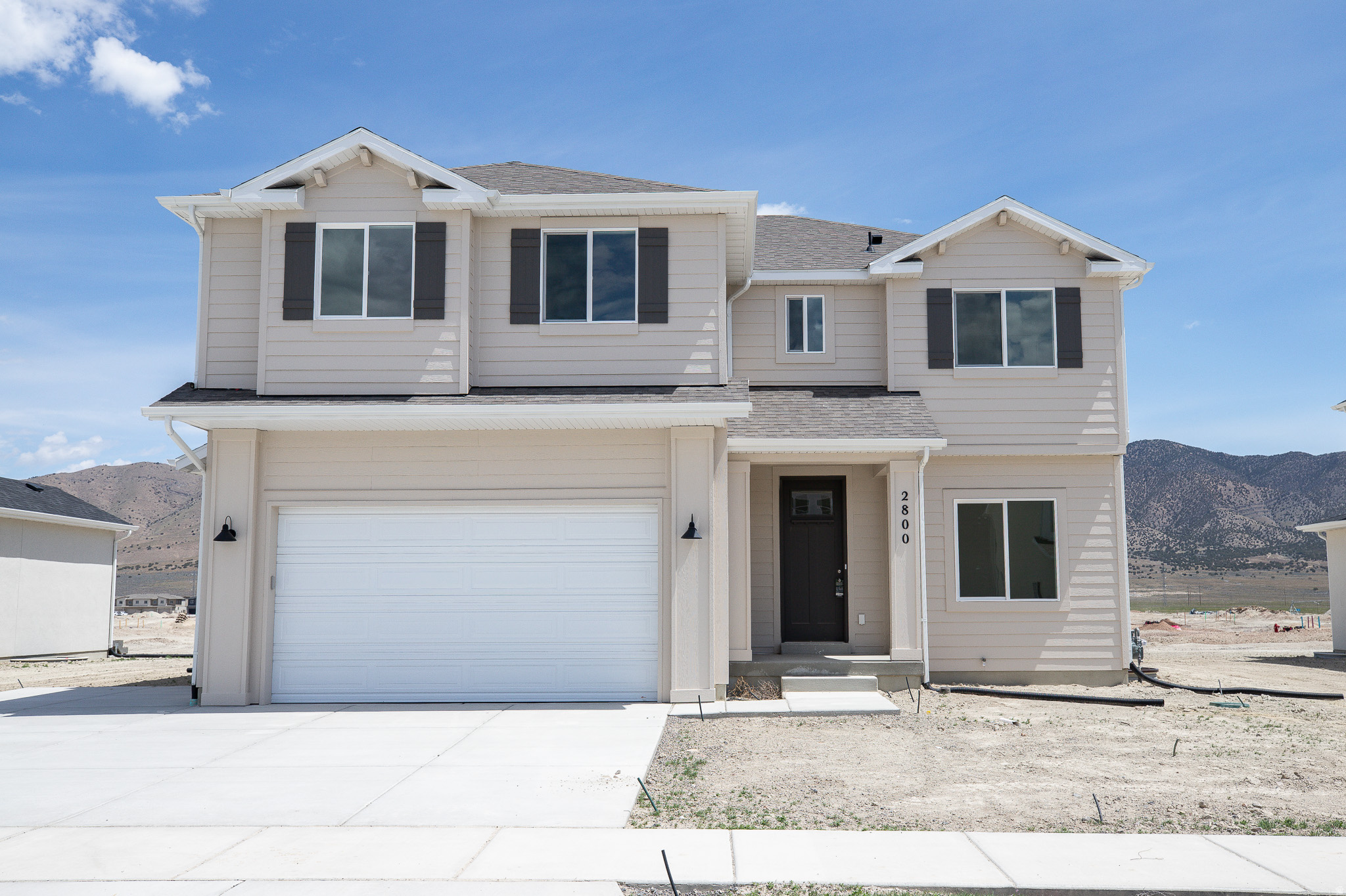 AMAZING $20,000 TOWARDS CLOSING COSTS, RATE BUYDOWN, OR PRICE REDUCTION REGARDLESS OF LENDER! (Talk to agent about details). Must-see Parkway Fields Community in Eagle Mountain! Move-in ready! This beautiful home built by Flagship Homes features 4 bedrooms, 2.5 bathrooms, quartz slab countertops, painted cabinets, laminate flooring on the main level, a large loft on the 2nd floor, a completed basement entrance with plumbing for kitchen and washer in basement, landscaped front yard, 2 car garage, and backyard (can be landscaped for an additional charge). The backyard is bounded by a decorative concrete wall. The primary bedroom has a vaulted ceiling, large walk-in closet, and dual sinks with a separate tub/shower. With an unfinished basement, this home provides an opportunity for an ADU as well as space for storage and room to grow. (If preferred, basement can be finished for an additional charge.) Call for more information or stop by our model home at 1546 E. Starling Lane, Eagle Mountain for a tour. Model home hours: Monday-Saturday 11 AM - 6 PM. Buyers to verify all information. Square footage is from house plans.
