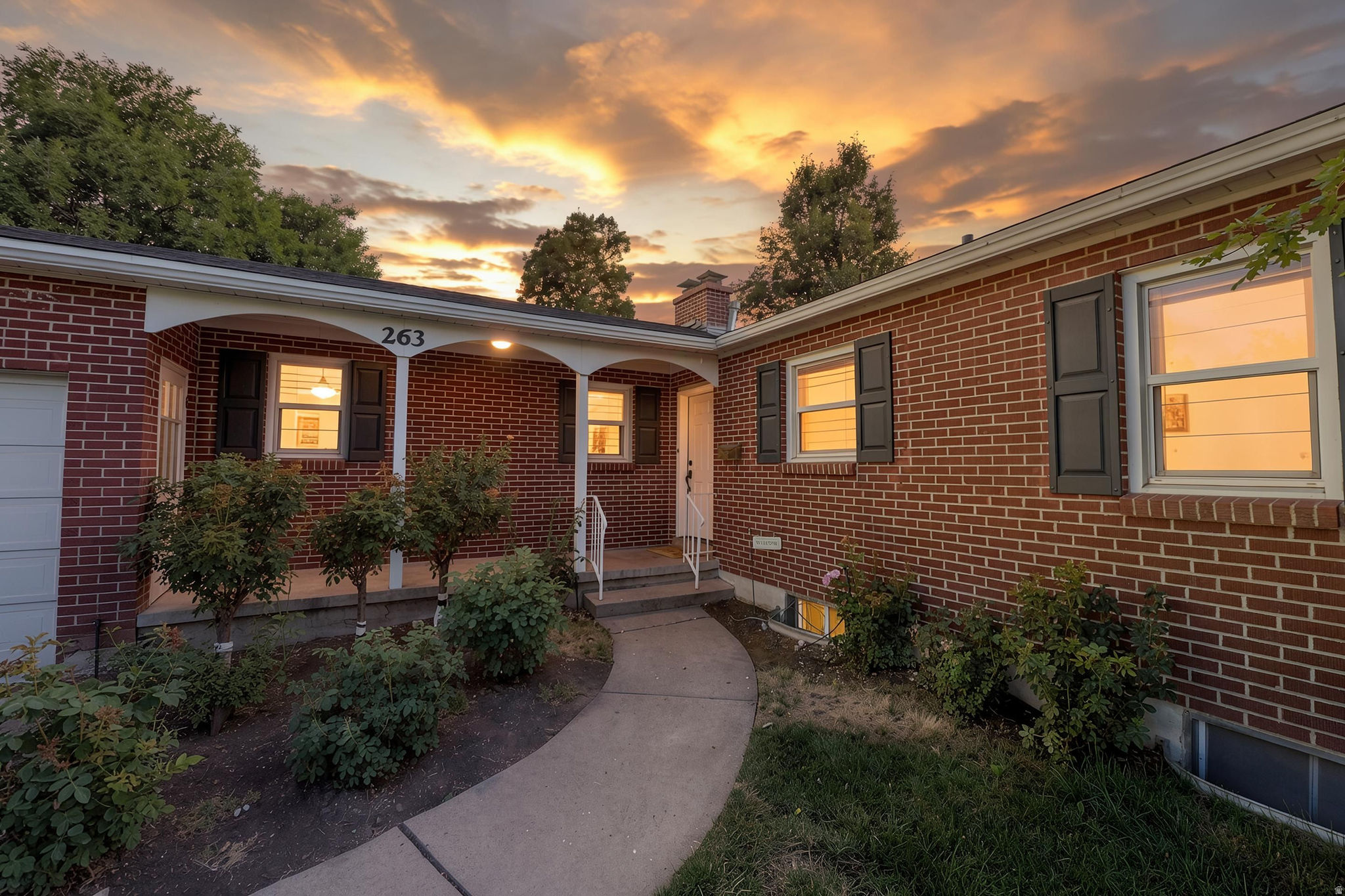 Charming brick rambler in the heart of Kaysville-location, character, and comfort all in one. Conveniently situated near the Kaysville Library, park, and splash pad, with quick access to Highway 89 and just minutes to I-15 for an easy commute. Inside, you'll love the beautiful wood floors, a spacious kitchen with granite countertops, and a semi-formal dining area perfect for everyday meals or hosting. Downstairs, there's room to grow in the basement, offering the potential to make this a true 6-bedroom home. Step outside to a large, fully fenced backyard with gorgeous mountain views-ideal for summer BBQs, play space, pets, or simply relaxing under the open sky. A true Kaysville gem-come see it for yourself! ***Square footage figures are provided as a courtesy estimate only and were obtained from Weber County. Buyer is advised to obtain an independent measurement.***