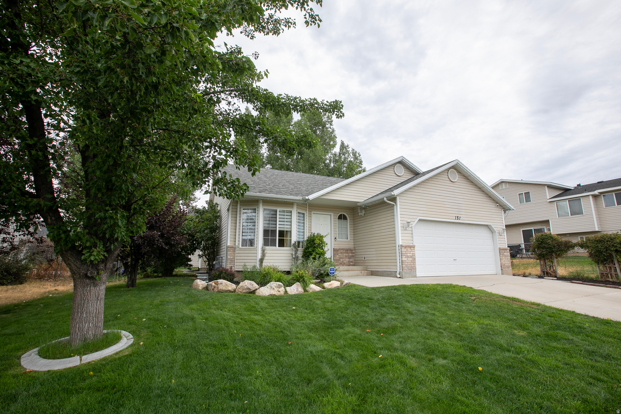 Welcome to this beautifully maintained 6-bedroom, 3-bathroom home located in one of Clearfield's desirable established neighborhoods. Thoughtfully designed with comfort and functionality in mind, this spacious home offers an open, inviting floor plan filled with natural light and generous living spaces perfect for both everyday living and entertaining. The spacious kitchen features abundant cabinetry and counter space while flowing seamlessly into the main living and dining areas, creating the perfect gathering place for family and friends. The versatile layout provides plenty of room for a growing family, guests, a home office, or hobbies. Step outside to a fully fenced backyard with ample space to relax, entertain, garden, or play. Conveniently located near schools, parks, shopping, dining, and freeway access, this home offers the perfect combination of comfort, convenience, and location. Don't miss your opportunity to make this exceptional Clearfield home yours. Schedule your private showing today! Square footage figures are provided as a courtesy estimate only and were obtained from county records. Buyer is advised to obtain an independent measurement.