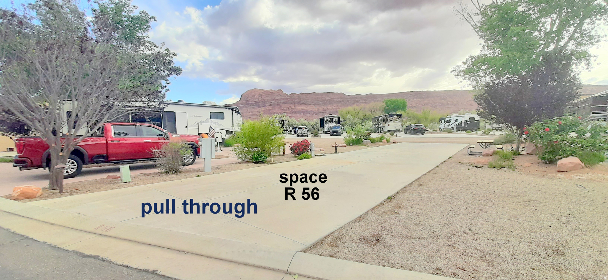 Own a piece of the Rock! Or just enjoy owning this nightly RV rental investment spot at the Portal RV Resort by Roberts Resorts has rebranded to Village Camp Moab. Yes, it is a pull through lot for easy parking and easy hook ups. This large concrete pad 87' long x 20' wide fits your extra large RV and a casita can be built in this area and still have room for your motor home, A graveled area 18' wide x 22' deep side space is a great place to park your tow behind vehicle or visitor parking. Rubicon Trail 56 is located close to the pool, hot tub, pickle ball court, the pond, laundry service area, men's & ladies bathrooms, the exercise gym and the pathway to the dog park. Enjoy views of to the western views of the Colorado River's famous Portal, southeast, views of the La Sal Mountains, eastern and west views of the Red Rock walls of Moab and the views of the Portal Pond. There are open areas with paths leading to seating areas that take in the views and or are a great place to read a book. When you are not in town, The management of this park can rent out your investment property for you. This is an easy, carefree investment, securing a place to park your RV when in the Moab area. Acreage figures are provided as a courtesy estimate only and were obtained from county records. Buyer is advised to obtain an independent survey measurement. The fees include basic cable, pool and grounds maintenance. http://www.portalrvresort.com/rules---regulations.html