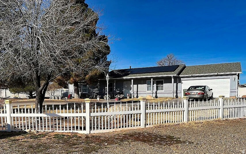 Seller constructed this well-built home on a spacious .86-acre lot! This 3-bedroom, 2-bath property featuring tile and carpet throughout, durable oak cabinets, granite countertops, and stainless steel refrigerator, stove, and dishwasher.  Enjoy a large laundry room and a  garage that offers built-in shelving.  Outside, you'll find a concrete driveway, grass and trees, a large back patio,  front patio, and a very large backyard with a large  shed - plenty of room for storage, hobbies, toys, etc.