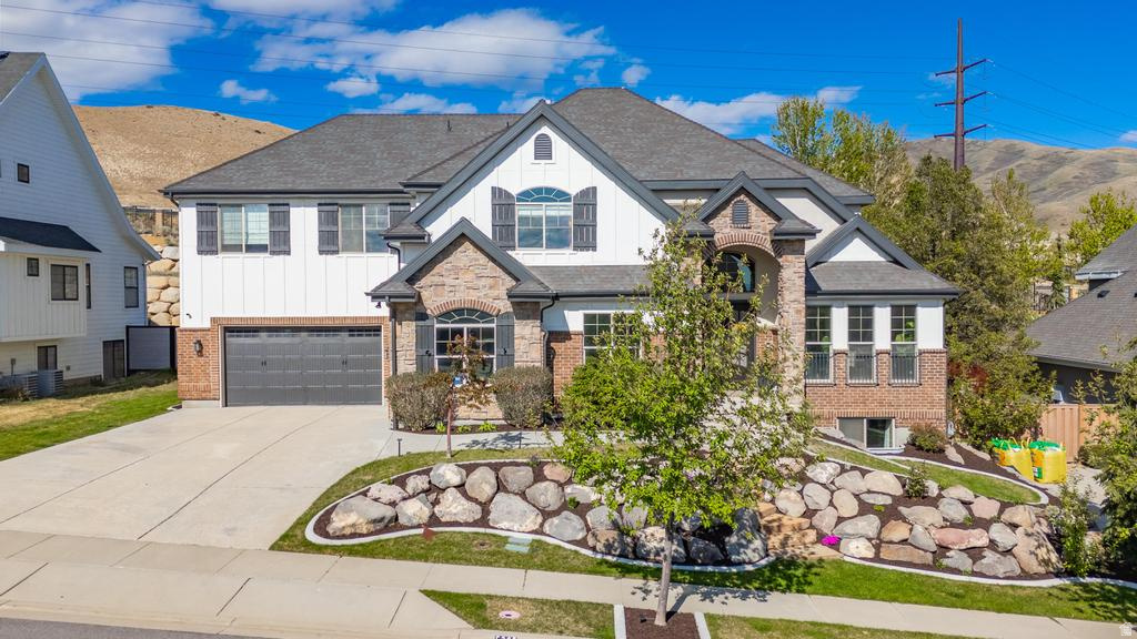 **OPEN HOUSE SATURDAY 6/13 FROM 12PM-2PM** This is the one you've been waiting for. Tucked at the end of a cul-de-sac in Traverse Mountain, this home delivers privacy, views, and zero through traffic-something that's getting harder and harder to find. Surrounded by multi-million dollar homes, you're stepping into a location that holds value and elevates everything around it.  Inside, the great room is exactly what you want-open, bright, and filled with natural light. The kitchen is dialed in with a Wolf range, Sub-Zero fridge, and Bosch dishwasher... not builder grade, not "upgraded later"-done right from the start.  The oversized 3-car garage is already wired for electric cars and gives you the space you actually need-whether it's trucks, toys, or both.  Downstairs, you've got a fully functional mother in law apartment with its own entrance!  Guests, multi-gen living-it just works.  Step out back to a fully landscaped, east-facing yard with no backyard neighbors. Cool summer evenings, shaded afternoons, and nothing but open space behind you.  And when you want to get out, you've got access to multiple community parks, plus the Traverse Mountain pool and clubhouse, gym, tennis courts, and pickleball courts-everything you need without leaving the neighborhood.