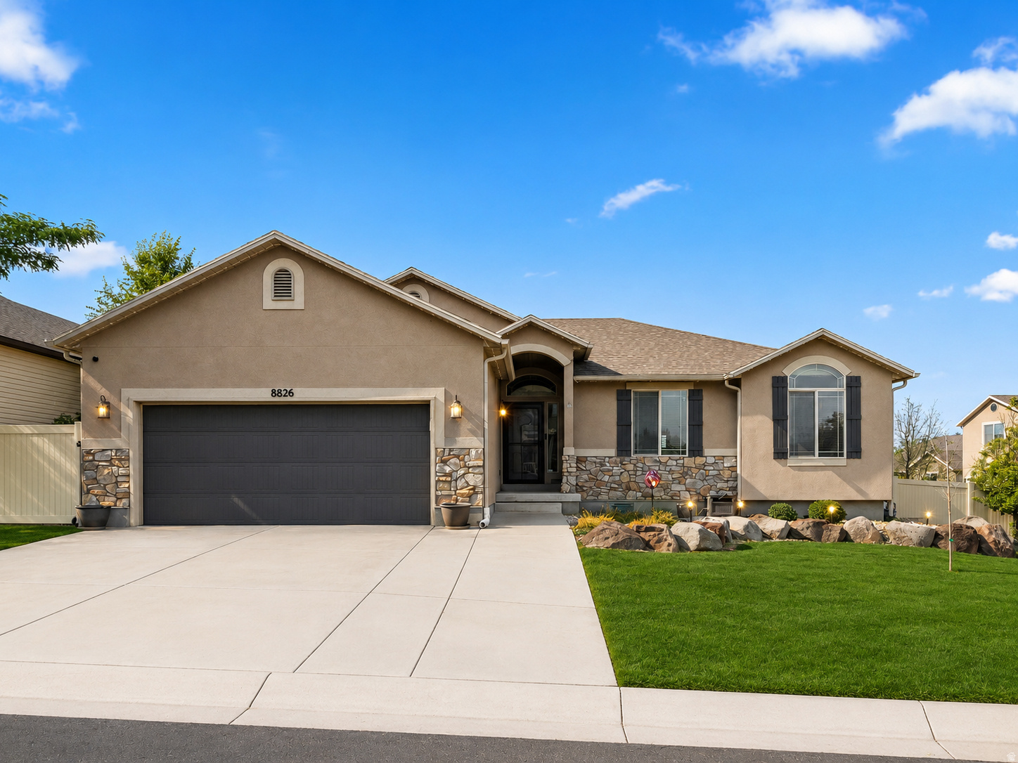 Tucked inside a desirable gated community, this inviting rambler sits  on a corner lot, fully landscaped and fenced yard. Step inside to discover hardwood flooring, an open layout, and spaces designed for both everyday living . The main-floor laundry adds convenience, while the 3 bedrooms provide room for family, guests, or a home office. Plus a 2 car garage and plenty of room to park in the driveway.   The finished basement family room creates the perfect gathering space for movie nights, game days, or relaxing evenings at home. With additional unfinished space, there's plenty of room to expand and customize the home to fit your future needs, extra bedrooms, a hobby space, a home gym, or additional storage.  Located in a desirable gated community, this home offers the perfect blend of privacy, room to grow, and fun parks right in the neighborhood.