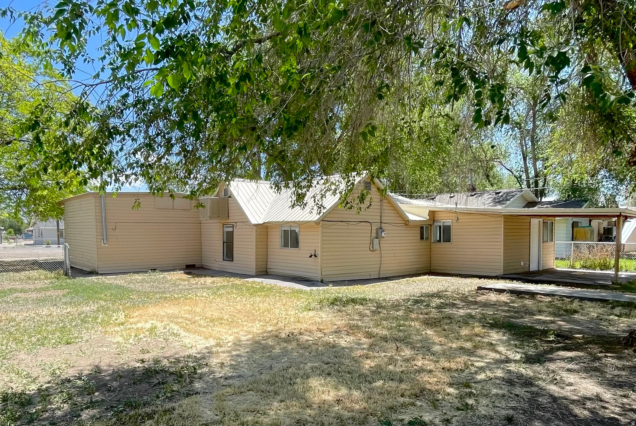 Beautifully remodeled home situated on nearly a half-acre lot! This move-in ready property features a fully updated kitchen, remodeled bathrooms, fresh interior paint, new flooring, updated hardware, and modern lighting throughout. The refrigerator, appliances, and window coverings are included, making this an exceptional value. Enjoy the spacious lot with plenty of room for outdoor living, gardening, parking, or future improvements. Priced to sell and ready for its new owner.