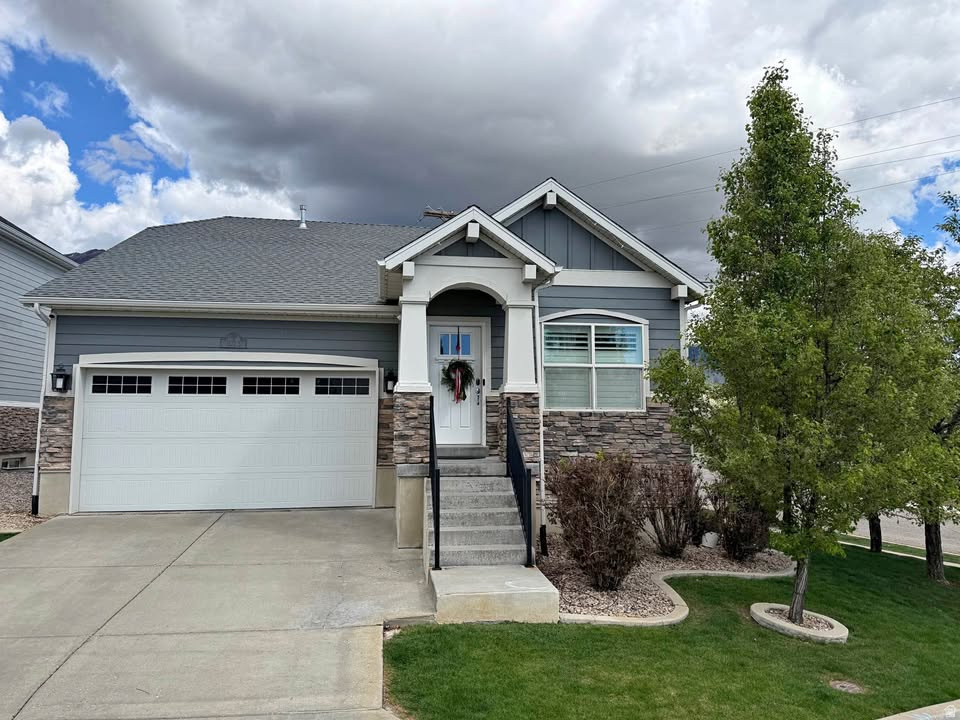 This immaculate rambler in Fruit Heights is nestled in one of Northern Utah's most desirable locations. The interior features an open great room and kitchen, granite countertops, upgraded appliances, custom lighting, vaulted ceilings, and a spacious primary suite complete with a walk-in closet and a luxurious bath with a separate garden tub and shower.  Designed for both comfort and efficiency, the home includes a Nest thermostat, gas fireplace, quick-recovery 50-gallon water heater, and blown-in insulation for lower utility costs and affordable living. The basement offers a finished bedroom in a convenient location along with 9-foot ceilings that create an open, spacious feel.  Outside, the backyard is fully fenced and showcases breathtaking mountain views. The backyard is smaller needing minimal maintenance.