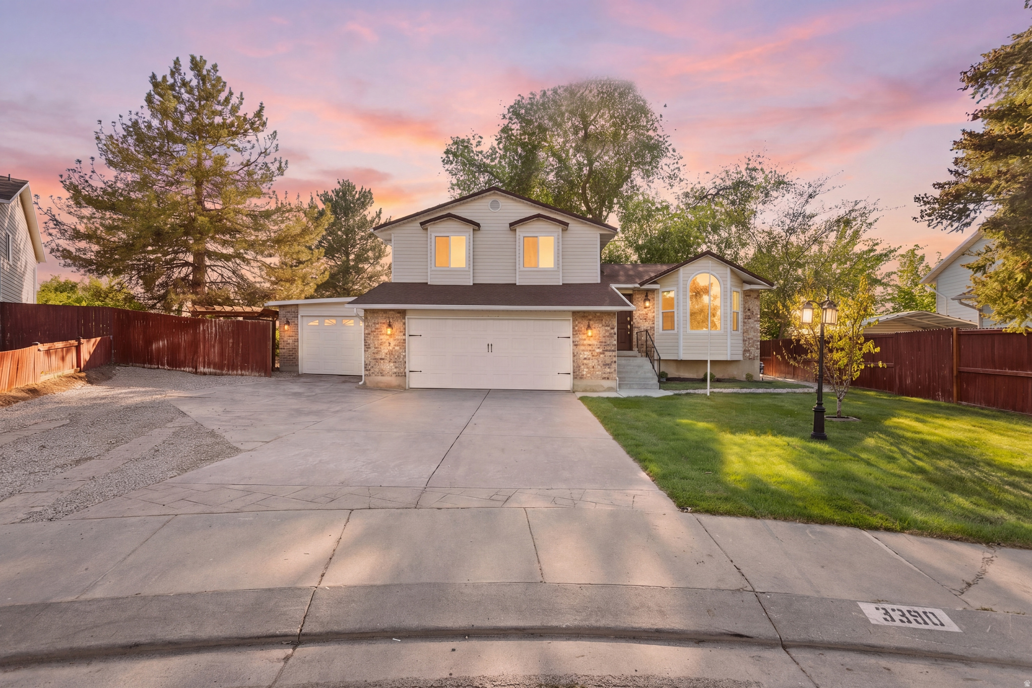 This remodeled West Valley home offers the space, updates, and parking that are hard to find together. Located in a well-established neighborhood near Hunter, the home provides quick access to parks, schools, shopping, dining, and major commuter routes throughout the Salt Lake Valley. Updated throughout and move-in ready, the home features a clean, comfortable feel with 5 bedrooms, multiple living areas, and an updated kitchen. Outside, the fully fenced .22-acre lot offers a covered deck, mature trees, and plenty of space to enjoy the yard. The 3-car garage provides ample parking and storage, along with a workshop area for projects, tools, or extra use. With the updates already completed, a large lot, covered outdoor space, and a strong garage setup, this home is a great option in the area. Square footage figures are provided as a courtesy estimate only and were obtained from county records. Buyer is advised to obtain an independent measurement.