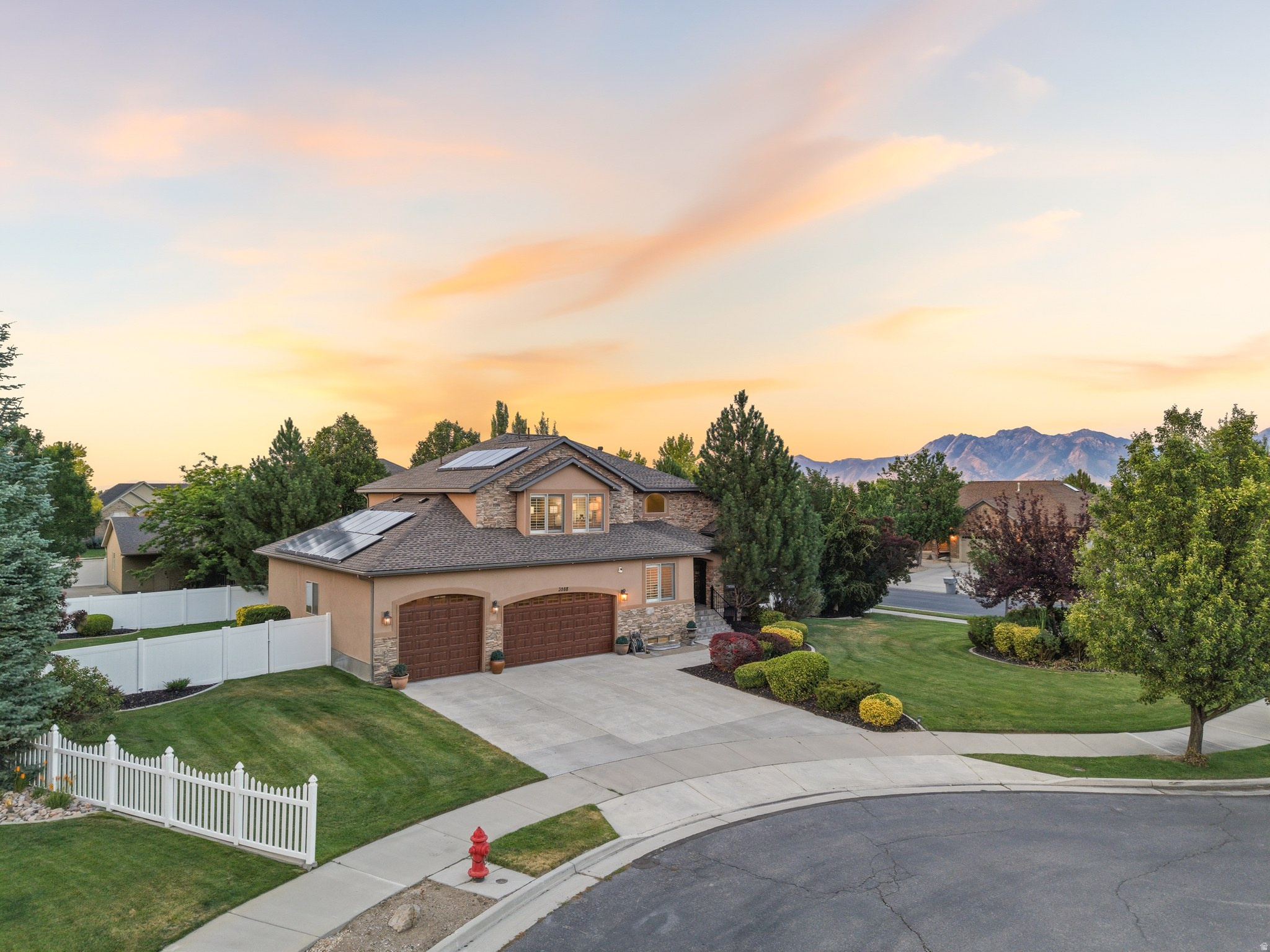 No HOA. Paid-off solar. Over $185k in updates and major system improvements already completed.Not all homes in this price range offer the same long-term value. Many of the largest future expenses have already been taken care of, including a new roof (2025), high-efficiency heat pump HVAC system (2024), two new water heaters (2024), paid-off solar, and a paid-off salt-free water purification system. That means more time enjoying your home and less worrying about costly repairs and replacements.Situated on a quiet cul-de-sac in the highly desirable Jones Meadows neighborhood, this executive-style home offers over 4,100 square feet, 5 bedrooms, 3.5 bathrooms, and an oversized 0.36-acre lot, one of the larger properties in the neighborhood. The flexible floor plan easily adapts to entertaining, working from home or everyday life.Inside, you'll find laminate wood and travertine flooring, plantation shutters, newly installed second-floor carpeting, a spacious kitchen that flows seamlessly into the main living areas, and a finished basement with a newly added shower.Step outside to a backyard designed for making memories, featuring an expansive covered Trex deck, outdoor kitchen with direct natural gas service, two patios, mature landscaping, vinyl privacy fencing, a brand new storage shed, and permanent Jellyfish exterior lighting. Paid-off solar helps keep typical monthly electric bills under $50, while the oversized four-car garage offers epoxy flooring, new storage cabinets, and abundant overhead storage.Conveniently located just minutes from The District, Mountain View Village, Oquirrh Mountain Marketplace, and Daybreak, you'll enjoy easy access to shopping, dining, entertainment, parks, and everyday conveniences, along with quick access to Bangerter Highway and Mountain View Corridor for an easy commute.This isn't just a larger home, it's a home where the major investments have already been made for you, allowing you to move in and enjoy it from day one.Square footage figures are provided as a courtesy estimate only and were obtained from public records. Buyer is advised to obtain an independent inspection and verify all information.