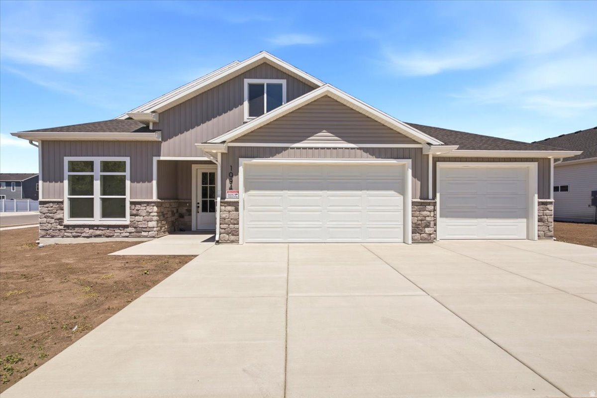 Amazing custom home with SINGLE LEVEL LIVING. Best of both worlds with a patio home main floor and large living area upstairs. Owners bedroom / bathroom suite, kitchen, family room and laundry are all on the main floor with a 2nd story with 2 bedrooms, family room and bathroom. This home features custom touches throughout, from the custom cabinets, quartz countertops, gas fireplace, walk-in pantry, large walk-in closets, high-end finish work, 3-tone paint, custom lighting, covered porch and so much more! All this on a nice South facing lot! Home is under construction with a completion estimate of late June to mid July.
