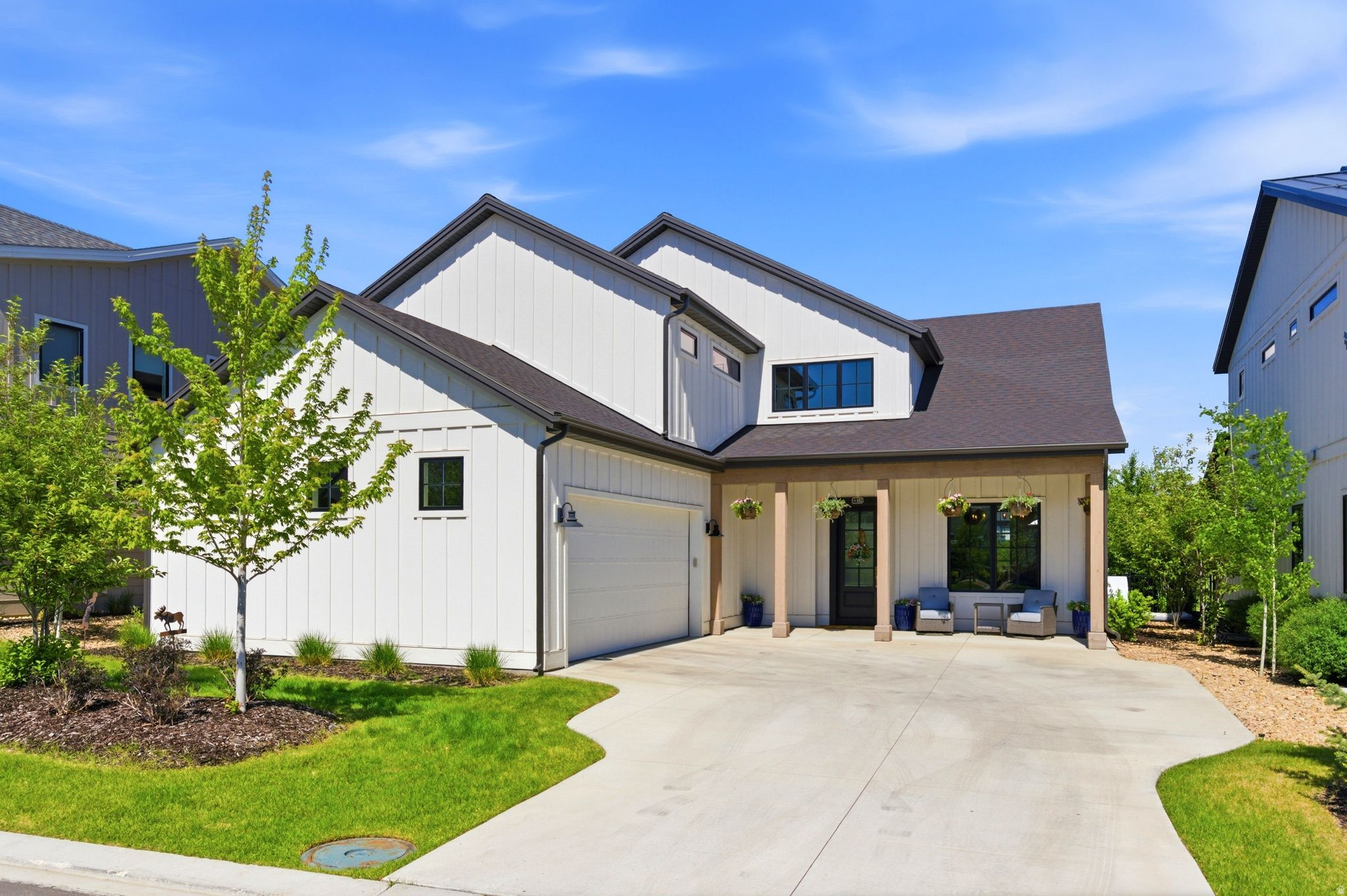 Set in the picturesque mountain town of Midway and located in the stunning community of Remund Farms, this premium lot includes a captivating view overlooking permanent open space and Memorial Hill. The pristine home welcomes you with oak engineered hardwood floors and an open-concept floor plan filled with natural light, creating the perfect setting for both everyday living and entertaining.  At the heart of the home is a designer chef's kitchen appointed with premium Bertazzoni Italian appliances, double ovens, a built-in griddle, beverage center, ice maker, and striking leathered Taj Mahal quartzite countertops-combining timeless elegance with exceptional functionality. The kitchen flows seamlessly into the dining and family rooms, making gatherings effortless and enjoyable.  The owner's suite offers a luxurious retreat featuring a spa-inspired ensuite bathroom with Carrara marble countertops, dual vanities, a built-in makeup vanity, a dedicated hair appliance storage drawer, enclosed stone tub and shower, private commode, and a spacious walk-in closet. Every detail has been thoughtfully designed to blend luxury, beauty, and convenience.  The laundry and mud room is equally well-appointed with a stacked washer and dryer, abundant upper and lower cabinetry, and a convenient drying bar.  Upstairs, you'll find an exceptional secondary family room, three guest bedrooms, two full bathrooms, a private office with outstanding mountain views, a private movie theater room, and a large storage space.  Outside, unwind in your own private oasis complete with a beautifully designed patio and custom fire pit, perfect for relaxing evenings and entertaining guests. The oversized garage offers 3-car capability with ample room for vehicles, recreation equipment, and storage.  Enjoy all that Remund Farms has to offer, including peaceful walking trails, parks, gardens, an activity barn, pool, clubhouse, gym, and sports courts. Just minutes from world-renowned ski resorts, championship golf courses, reservoirs, and endless outdoor recreation, this exceptional property offers the perfect blend of luxury, comfort, and mountain living.