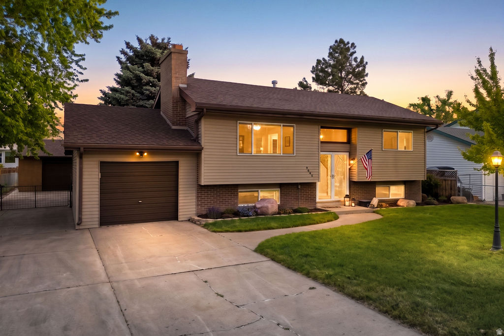 Multiple Offers received Highest and Best by Tuesday at 1 pm please. Sellers will go over offers that evening and decide. Welcome to this beautiful fully updated home nestled in a quiet Sandy neighborhood with Wasatch front mountain views out the front windows. Built in 1969 and thoughtfully updated from top to bottom, this 3-bedroom, 2-bathroom gem offers 1,758 sq ft of stylish, move-in-ready living on a spacious .22-acre lot. The completely remodeled kitchen features granite countertops for easy to clean modern living while both bathrooms have been refreshed for a functional contemporary feel. Upstairs boasts beautiful hardwood floors with carpeted bedrooms while the lower level is easy to maintain with carpet and tile. The AC and furnace are both less than 5 years old and are complemented by high-efficiency gas fireplaces for cozy Utah winters. In the summer enjoy a quiet evening on the sunset-facing deck with custom metal handrails, overlooking the sizable back yard and a raised garden box which are ready for your herbs, vegetables or flowers. With thoughtful enhancements including built-in speakers, CAT 5E ethernet, and a large finished walk-in storage area with floor-to-ceiling shelving, this home has it all.  In addition to the attached one-car garage, the 30x30 detached garage/shop is exceptionally well appointed with 220V power, 110V outlets throughout, natural gas heat, and wired ethernet; a perfect space for a workshop, EV charging, or additional storage.  With its rare combination of a fully updated interior, a massive 30x30 detached garage, and thoughtful modern upgrades just minutes from shopping, dining, TRAX, and world-class skiing, this home offers the perfect blend of comfort, functionality, and lifestyle. All the hard work has been done, just move in and enjoy.