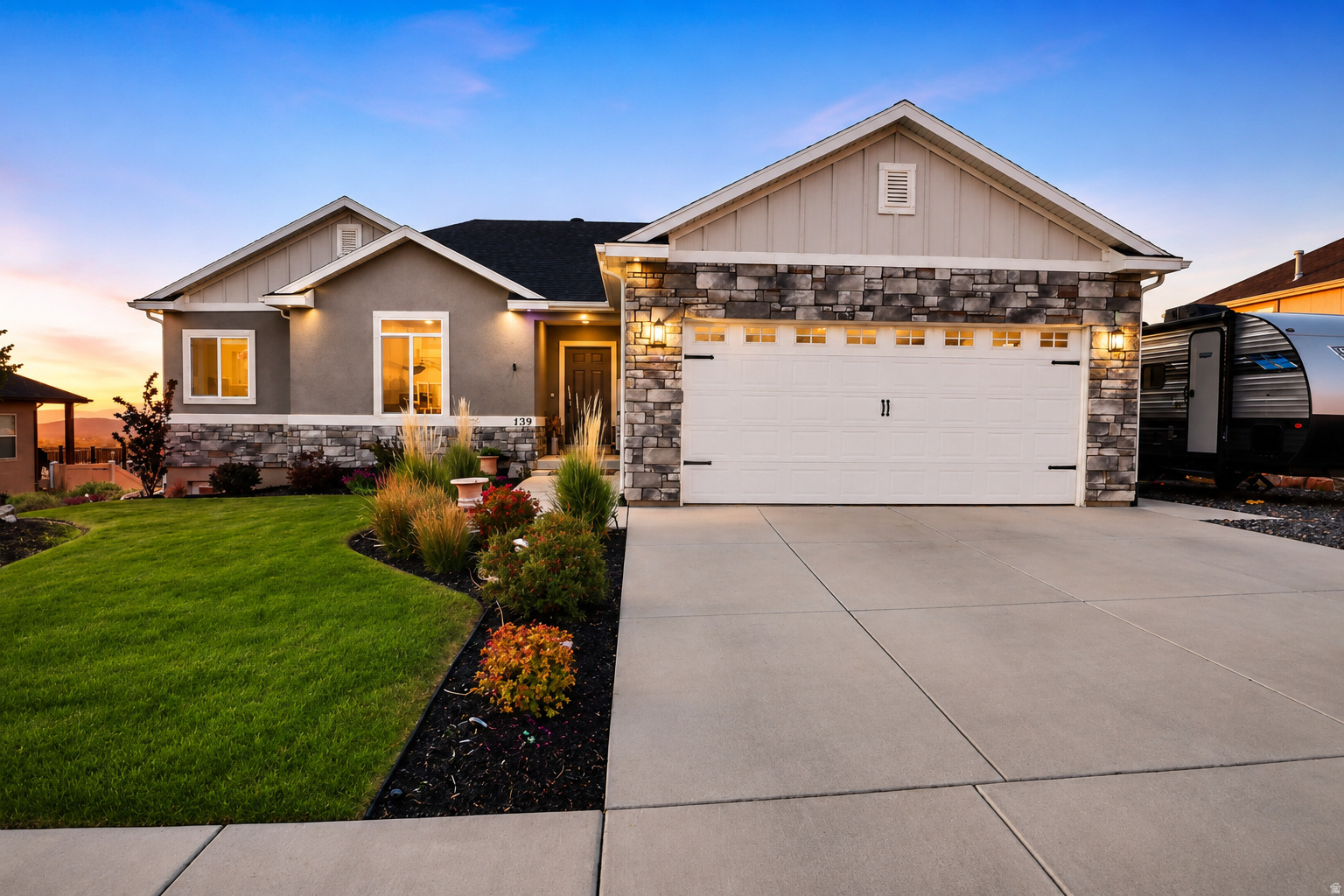 Welcome to this exceptional 5-bedroom, 3-bath home offering 3,674 square feet of thoughtfully designed living space on a .21-acre lot. Enjoy breathtaking valley views from a property that perfectly blends comfort, functionality, and income potential. Built with quality in mind, this home features durable 2x6 exterior walls, a suspended slab foundation, and a walk-out basement that maximizes both space and natural light. Inside, you'll find spacious bedrooms, custom blinds throughout, and elegant granite countertops that add a touch of luxury to the kitchen and living areas. A standout feature is the approximately 1,600 sq ft apartment-ideal for mother-in-law aprtment, multi-generational living, Airbnb, or long-term rental income to help offset your mortgage. The home also includes a large storage area that could easily be converted into a theater or recreation room, giving you flexibility to fit your lifestyle. Stay comfortable year-round with an advanced tankless water heater providing instant, continuous hot water, along with a high-performance water softening system designed to handle Utah's mineral-rich water. Washer and dryer hookups are conveniently located both upstairs and downstairs. Outside, you'll find RV parking, a storage shed, and easy freeway access for commuting convenience, all while enjoying a peaceful setting with stunning views. This home truly offers space, versatility, and opportunity-whether you're looking to expand, invest, or simply enjoy elevated living. There are 2 tours above, one is a 3d tour and the other is a video walk through tour.
