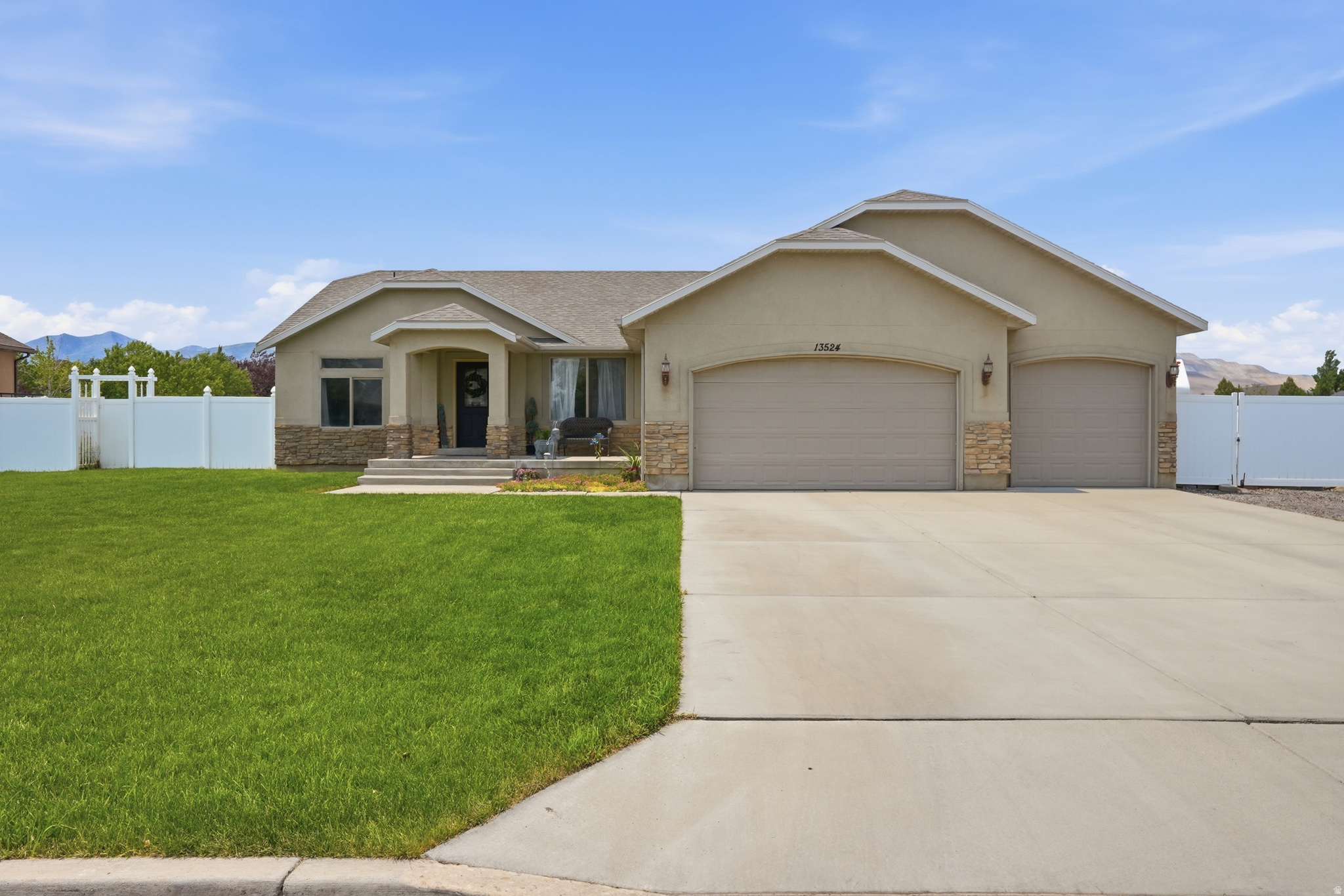 **Horse property in Herriman!** Situated on a fully fenced 0.56-acre lot in the desirable Rose Creek Ranches community, this property is zoned for horses and livestock and offers the space you've been searching for. The extra-long RV parking provides convenient access from front to back, with plenty of room for trailers, toys, equipment, and more.  This spacious rambler features just under 3,400 square feet with five bedrooms, three bathrooms, and all of your essential living spaces on the main floor. A three-car garage, two family rooms, and a finished basement provide flexibility for growing families, guests, hobbies, or entertaining.  Relax beneath the custom-covered patio that spans nearly the entire length of the home, complete with beautiful stamped concrete and plenty of room to entertain. Outdoor enthusiasts will love the nearby horse trails, hiking and biking paths, parks, and open space, while Mountain View Village, Real Salt Lake Academy, shopping, dining, and Herriman's many community events are just minutes away.  A/C was replaced in 2024, water heater replaced this year.