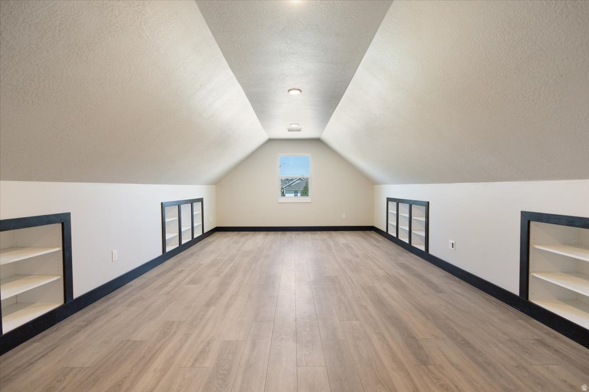 *** PRICE REDUCTION! This home has huge protentional! Price reflects current condition and work that needs to be done. **** Conveniently located just 15 minutes from downtown Logan, and just 6 minutes from Cherry Peak Ski Resort (with summer concert series). This 7 bedroom home is nestled in a peaceful neighborhood with striking mountain views! A few steps across the street brings you to a cozy park and playground area. In the 3 car garage you will find epoxy coated floors with a rare mechanics pit, a dream set up for car enthusiasts! The fully finished walkout basement has 3 bedrooms, a full bath and a brand new kitchenette. This (ADU) Mother in Law apartment has its own private entrance outside, but can also be accessed from inside should you chose not to rent it out. On the top floor you will find 3 bedrooms, a full bathroom and a bonus loft! The oversized loft would make a great playroom, hobby area or an extra bedroom! The main floor boasts an open floor plan with the kitchen and living room. Stainless steel appliances. The spacious master suite features a large bathroom with a separate tub and shower, and walk in closet. Bonus : 220 hook up in the garage along with hot tub hook ups outback, as well as tankless water heater and separate temperature controls for the top floor! This home is a blank slate, just waiting for its new owners to put in the final touches to make it theirs!
