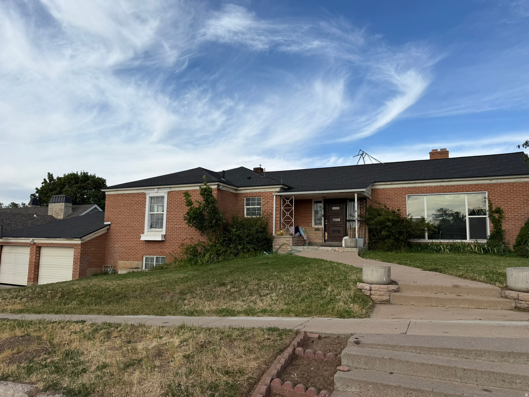 This solid 1950s all-brick rambler blends classic charm with smart updates. Original hardwood floors, fresh paint, and a beautifully updated main bathroom make the interior warm and inviting. Recent upgrades include a newer roof, furnace, central air unit, and windows-giving you peace of mind for years to come. The county has also completed an energy efficiency audit and made improvements to help keep your utility costs low. Step outside into a fabulous backyard retreat featuring mature shade trees, a new storage shed, and a fun above-ground pool area. An established orchard with apple, apricot, peach, cherry, and plum trees makes this outdoor space even sweeter. Well-maintained and move-in ready-this home has the charm you want and the upgrades you need. Seller requires 24 hours notice for showings.
